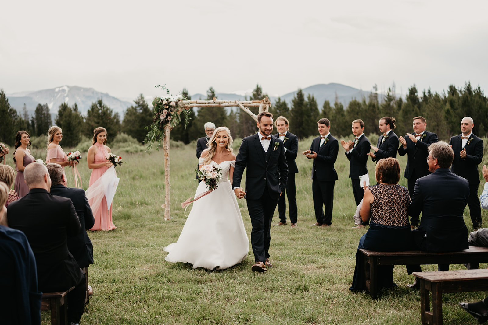 A couple smiling after their wedding