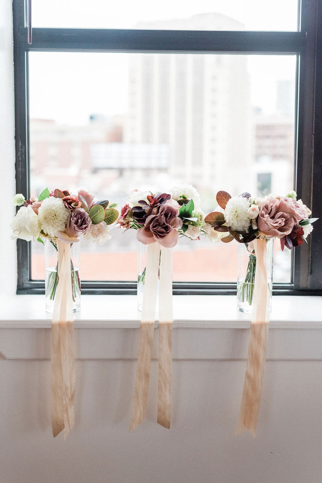 Bouquets sitting on a ledge