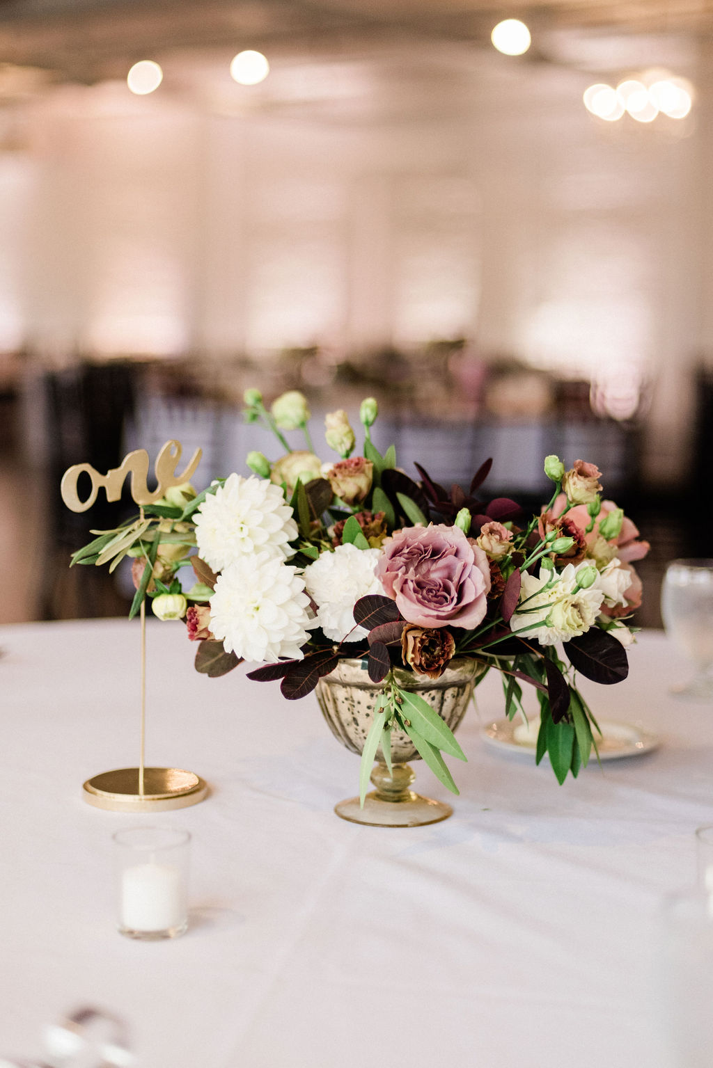 Tables set for a loft 310 wedding