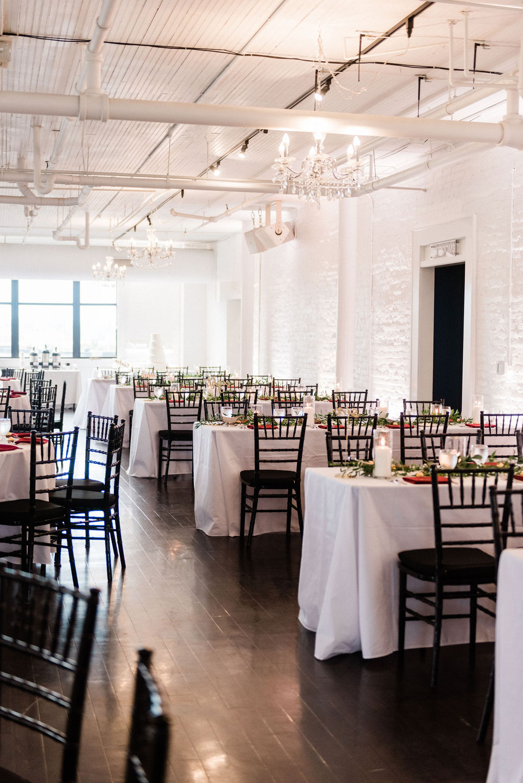 Tables set for a downtown kalamazoo wedding at Loft 310