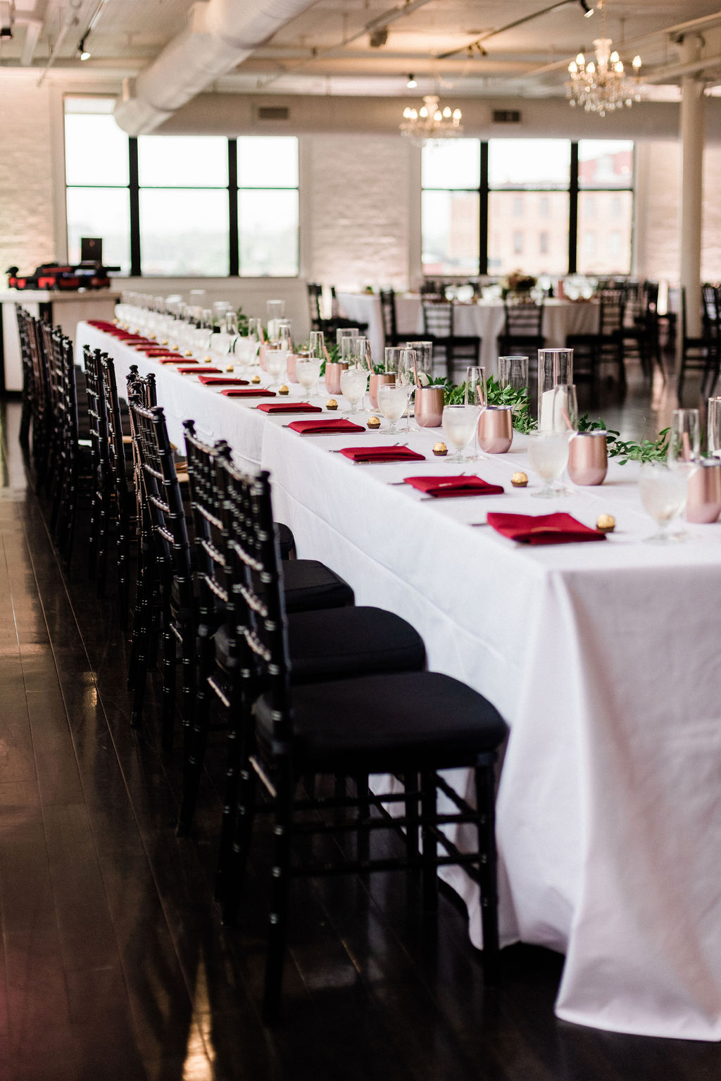 Tables set for a loft 310 wedding