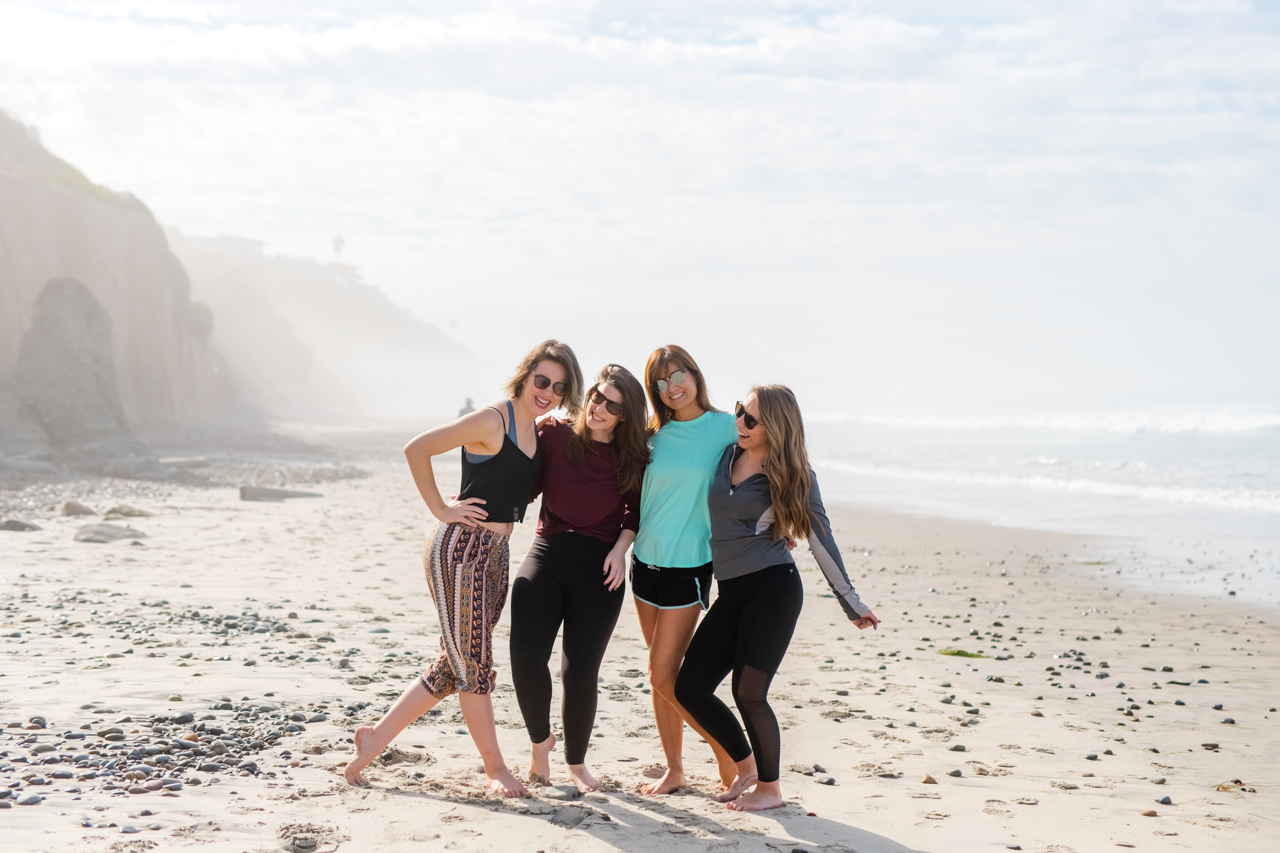 Girls smiling during a San Diego business retreat