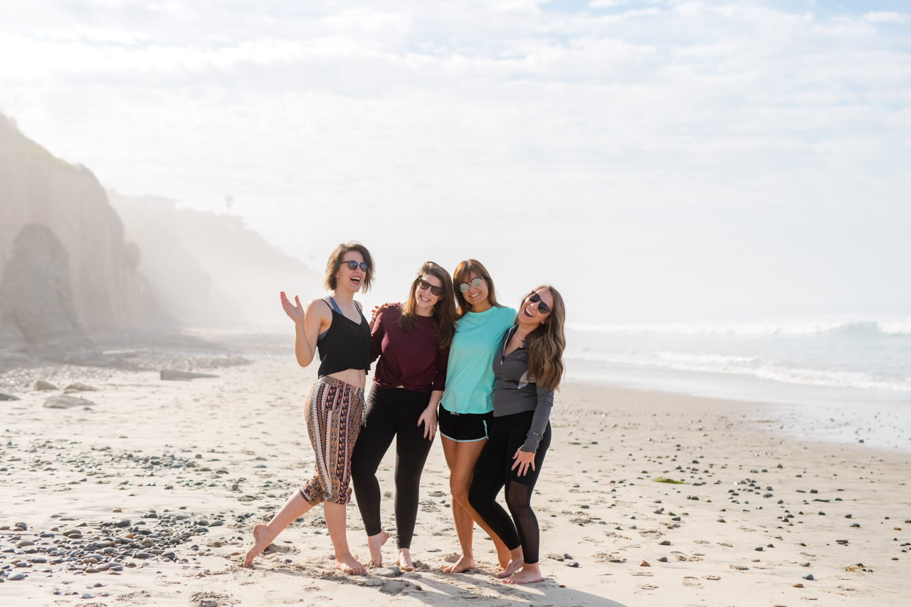 Girls laughing on the beach in San Diego, CA
