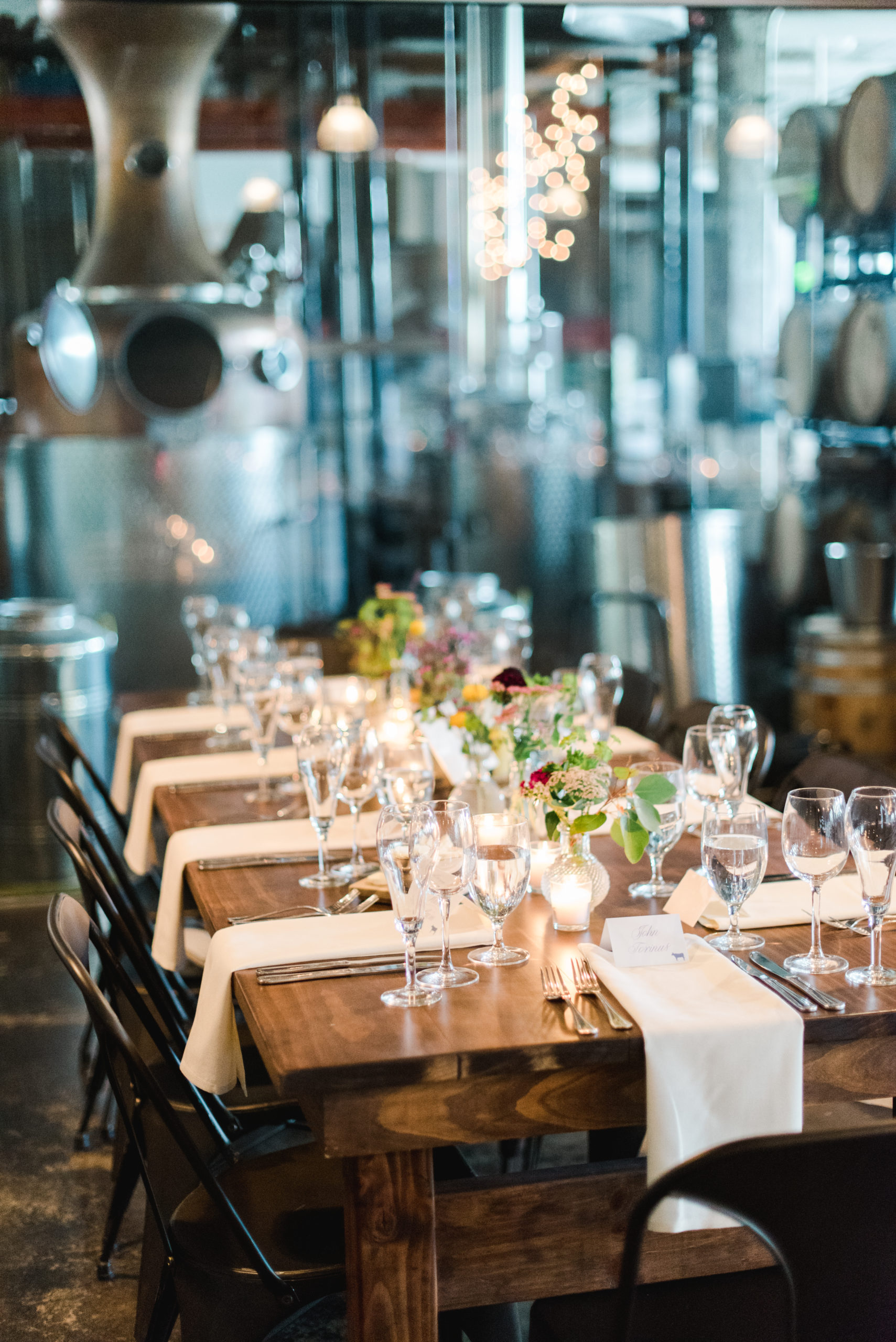 Tables set for a Journeyman Distillery wedding