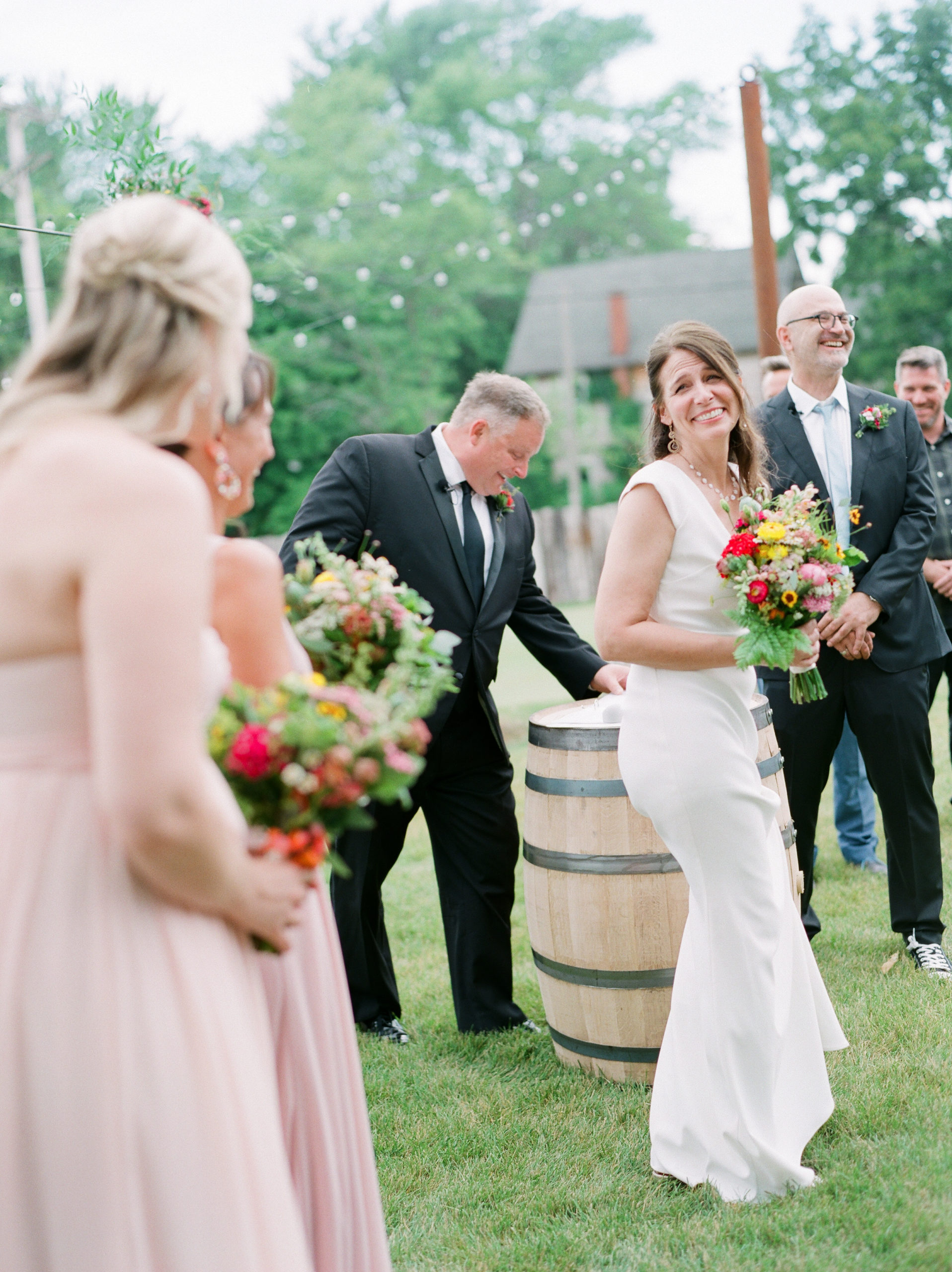 A bride smiling during her ceremony