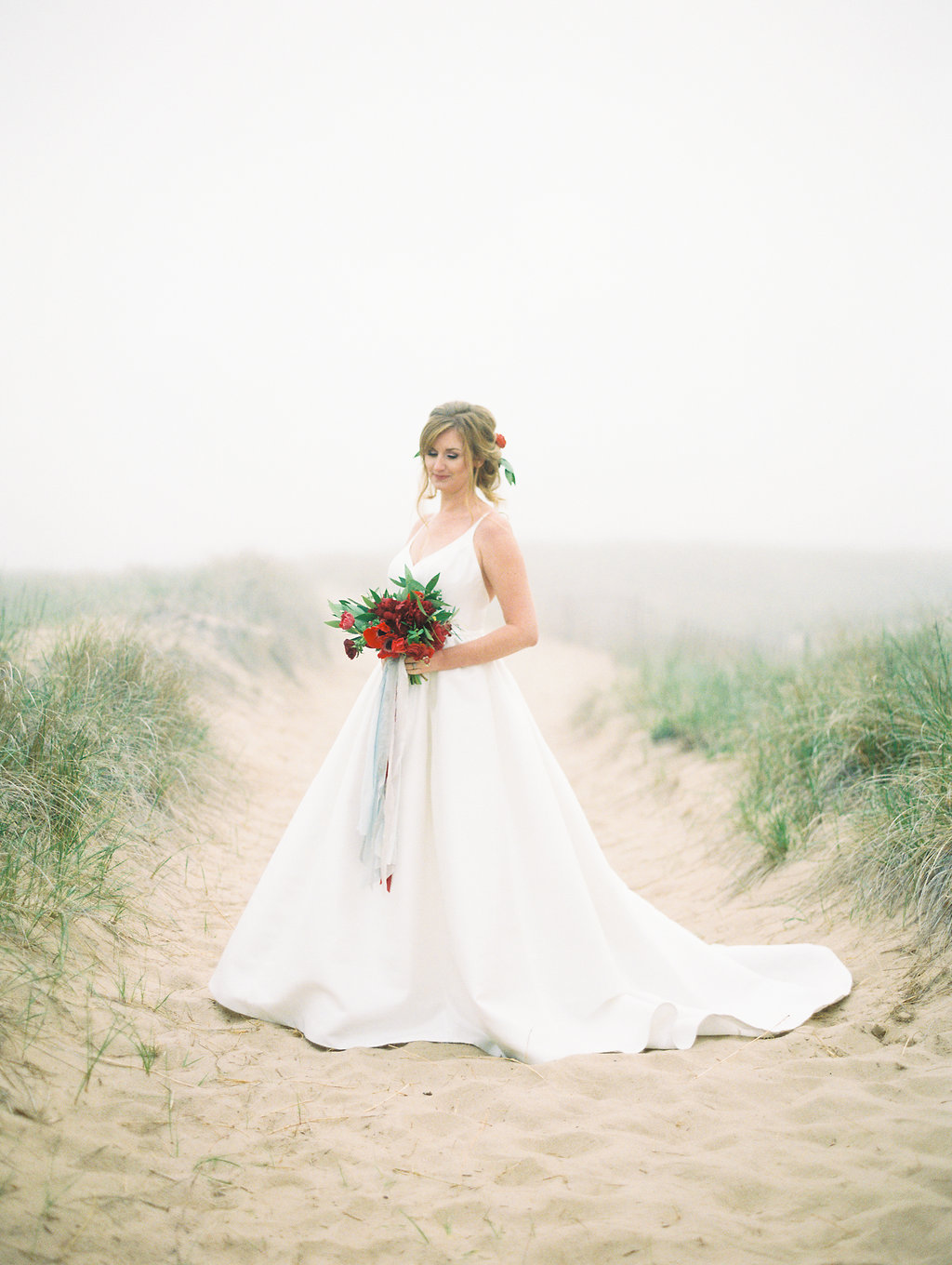 Bride smiling during her Lake Michigan wedding