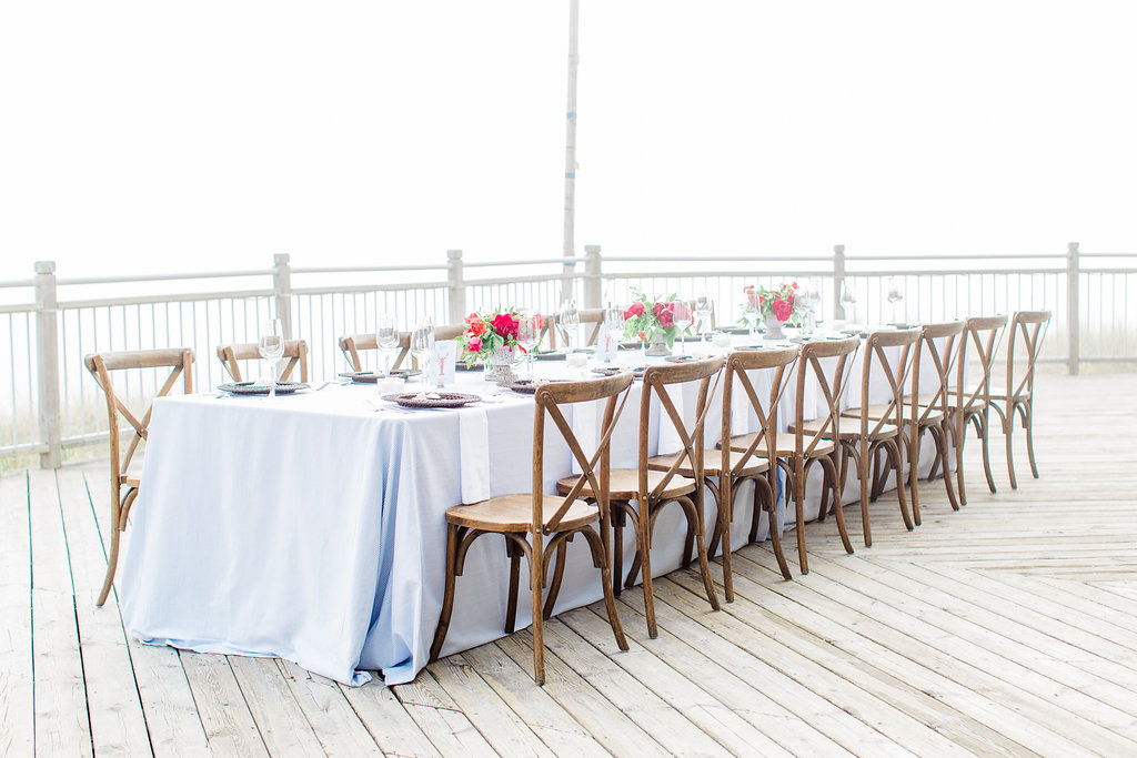 Table set on a deck for a Lake Michigan wedding