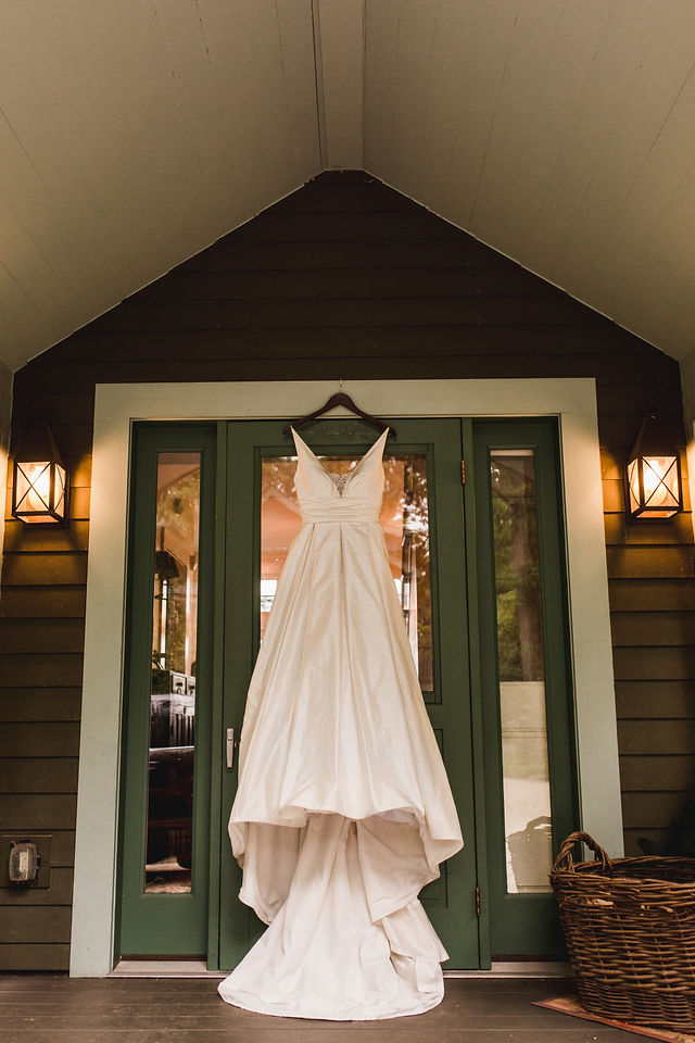 Wedding dress hanging from Door