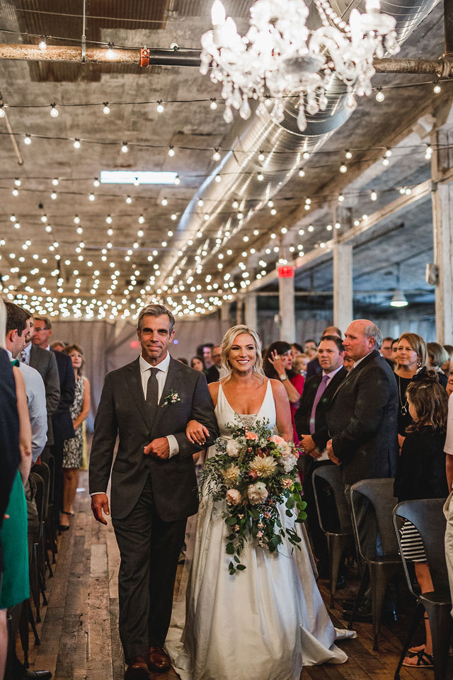 Father of the Bride and Bride walking down aisle together