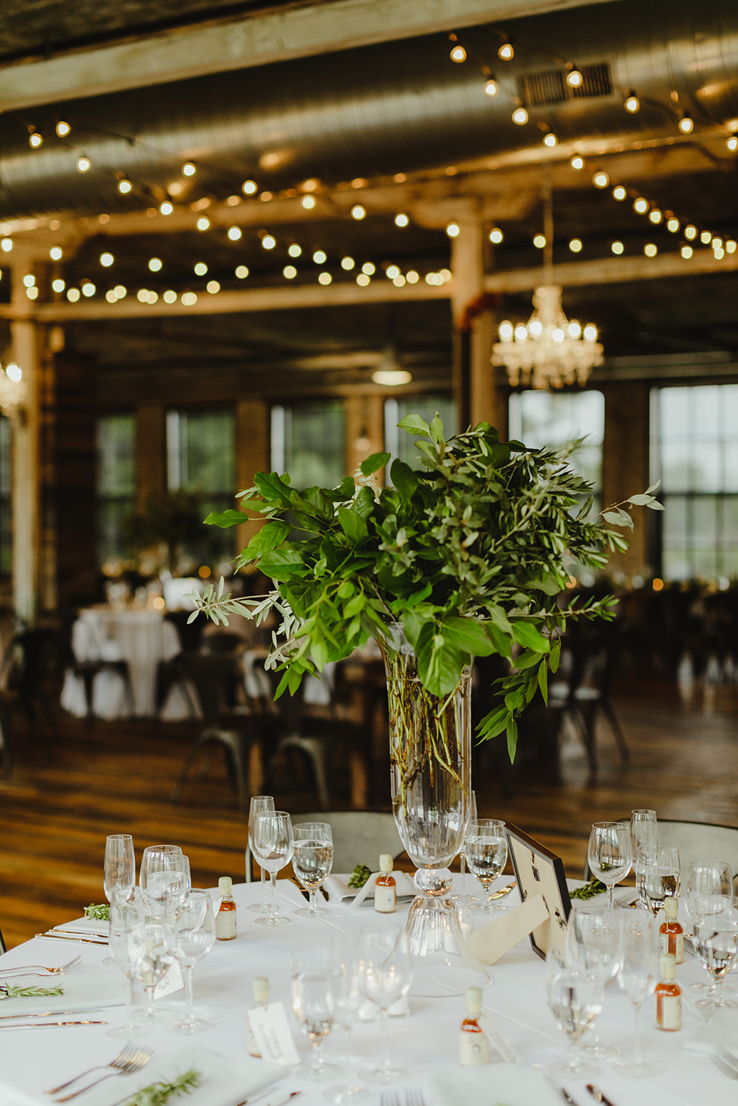 Tall greenery arrangements set for a Chicago destination wedding