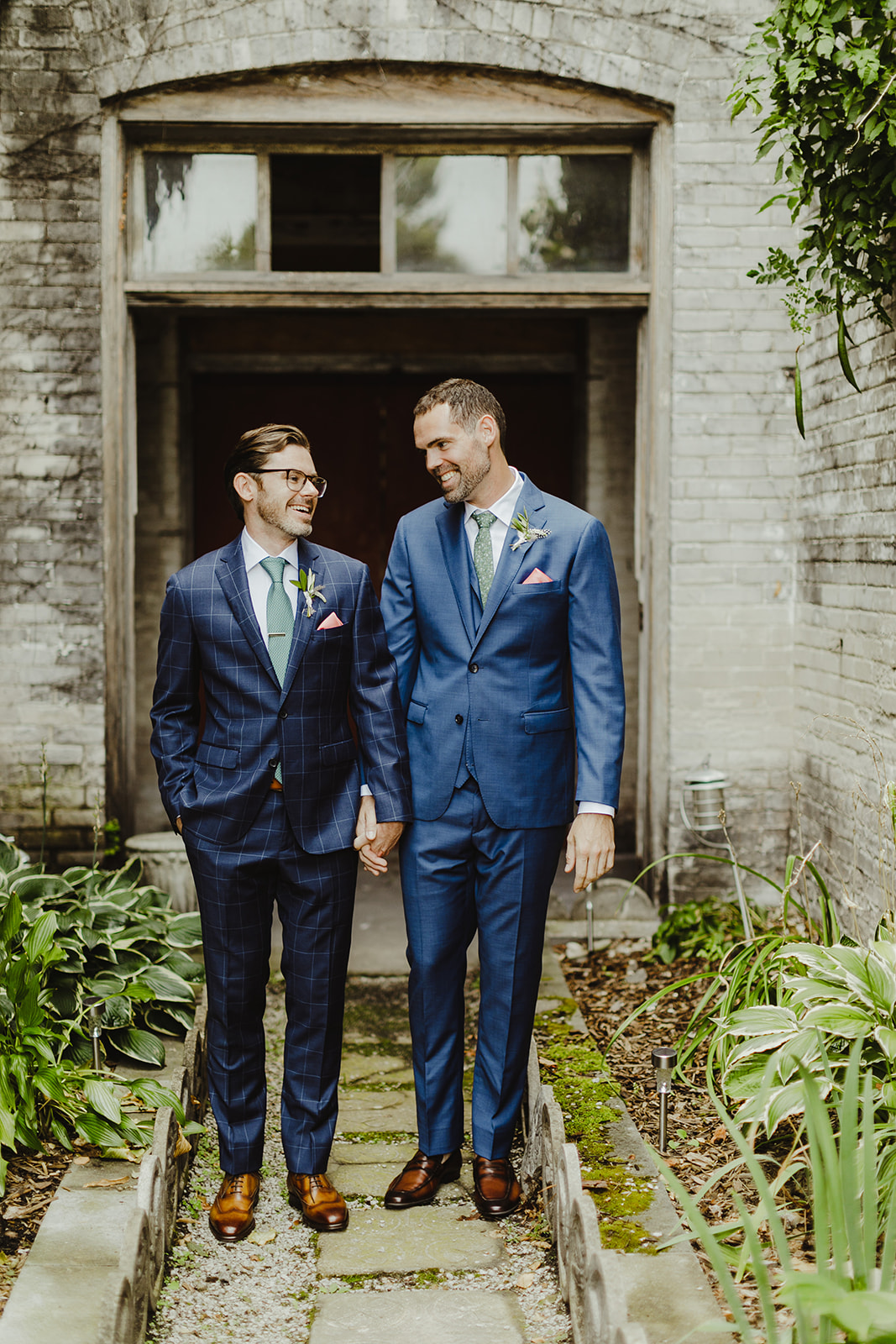 Couple smiling and holding hands