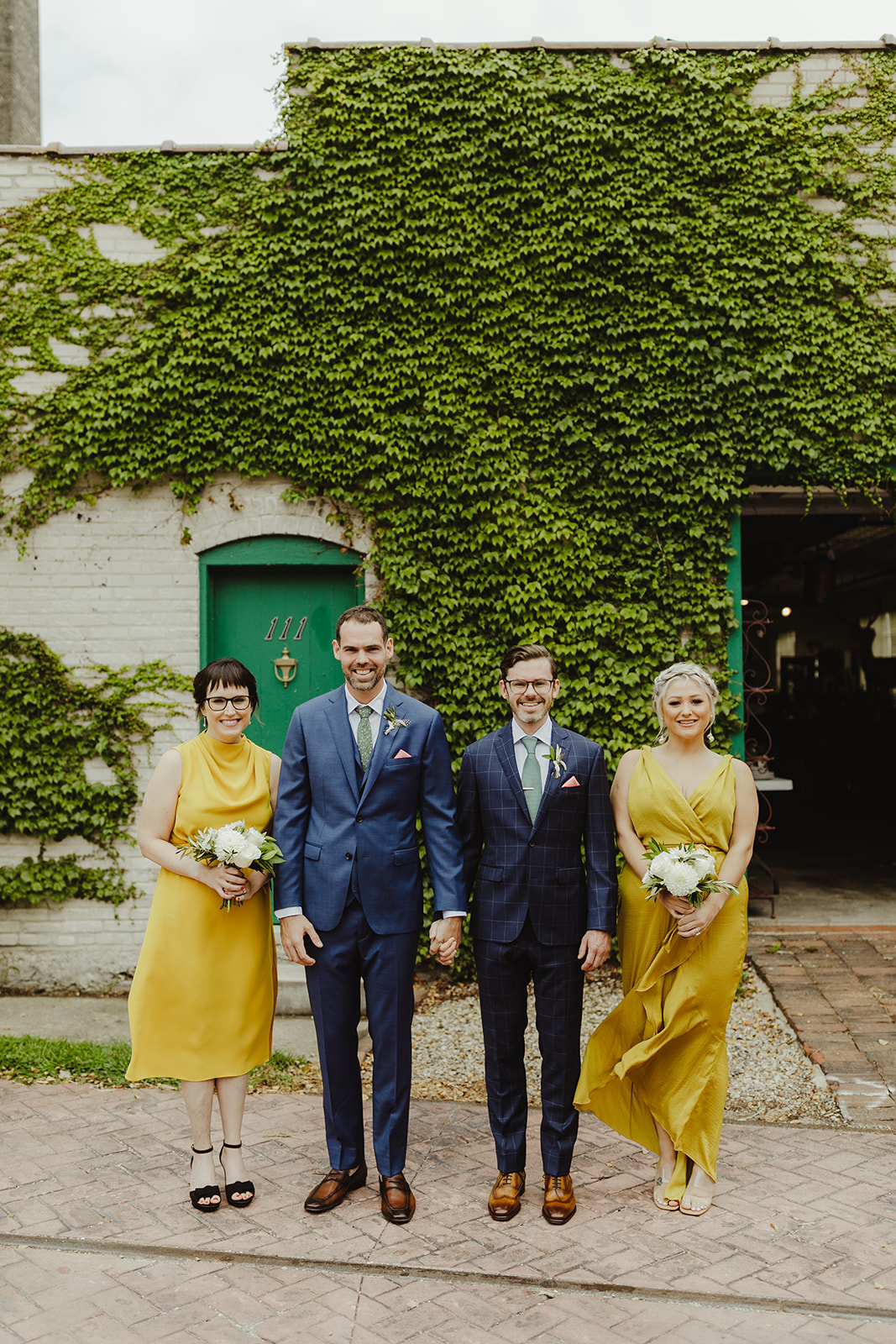 Grooms & bridesmaids smiling