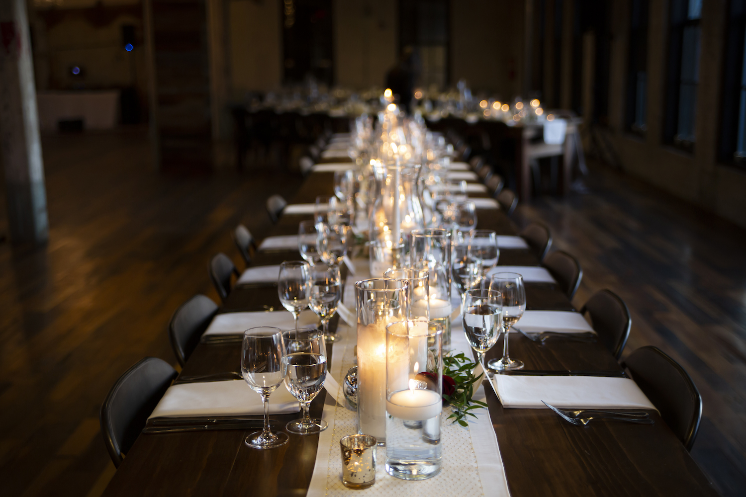 Candles on table at rustic Michigan wedding