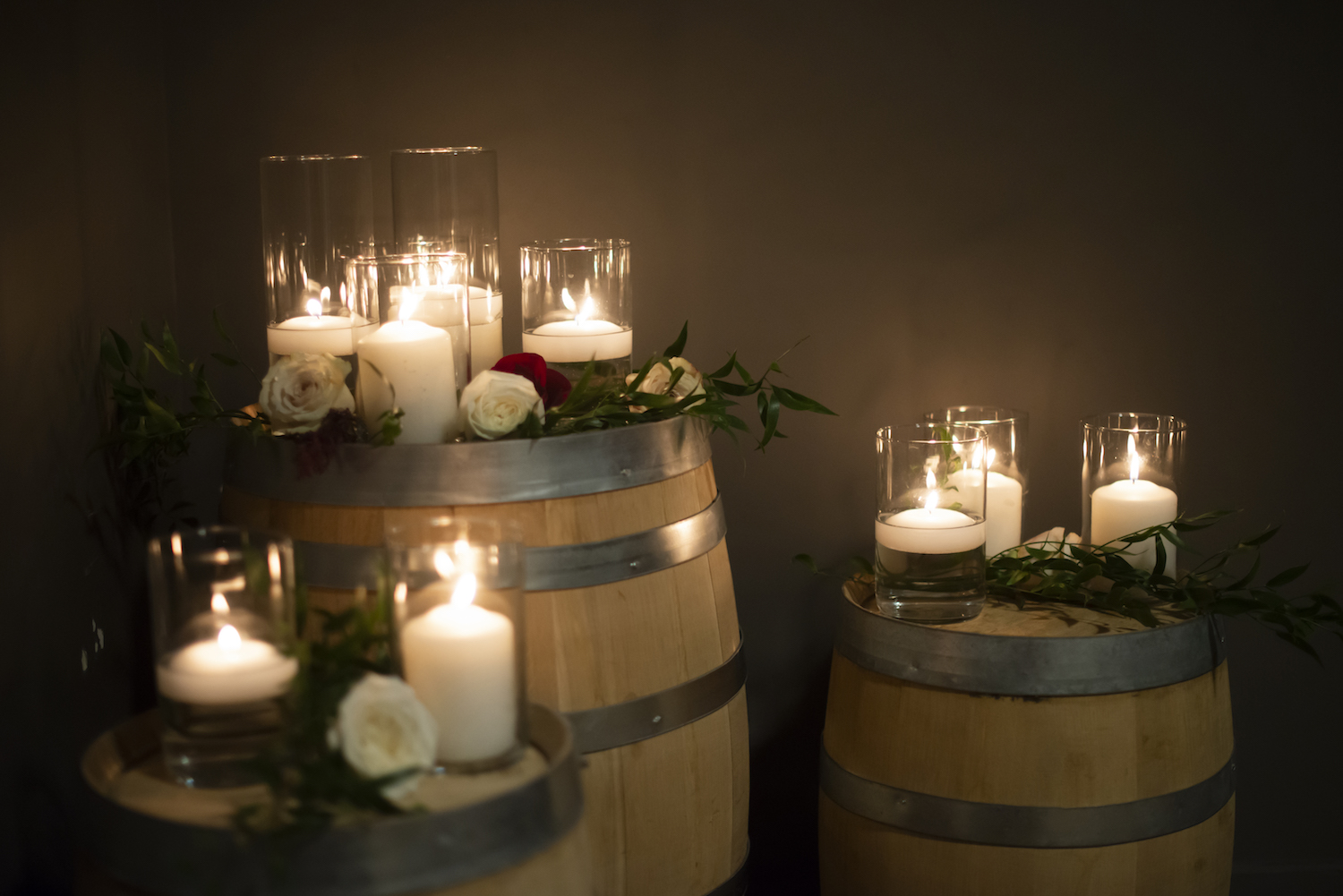 Candles lit at Journeyman Distillery rustic Michigan wedding