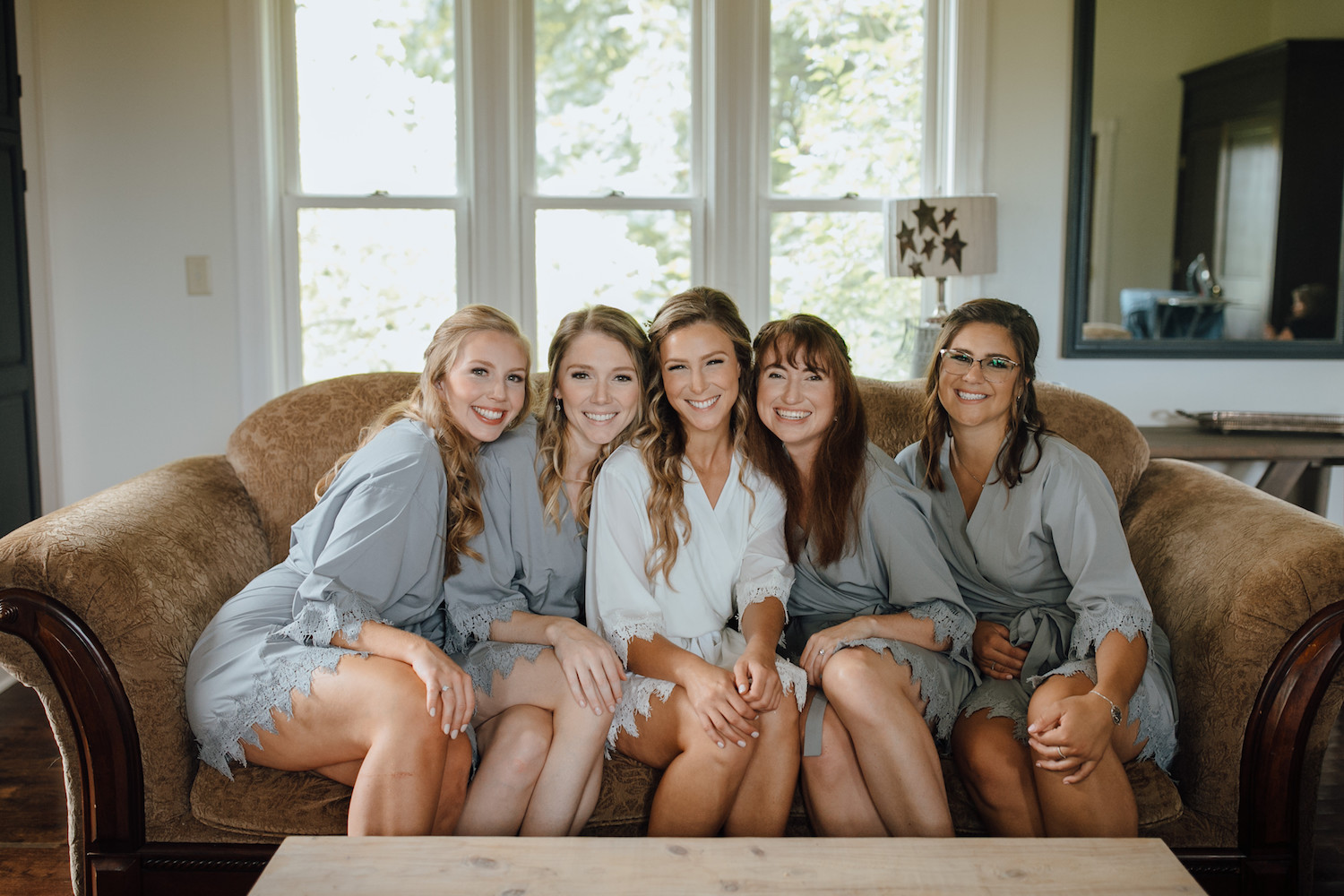 Bride with bridesmaids at Aurora Cellars wedding