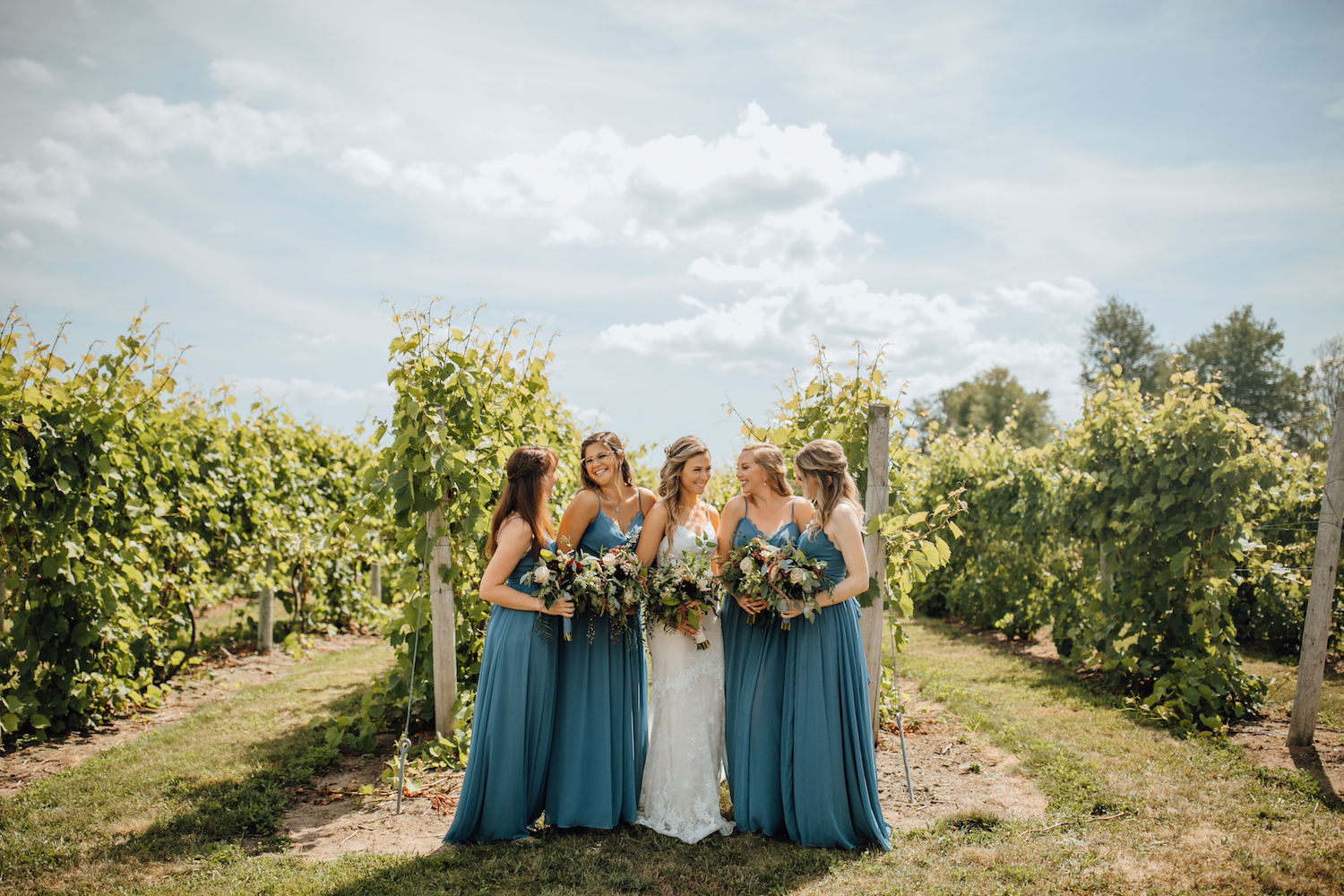 Brides and bridesmaids at Aurora Cellars wedding