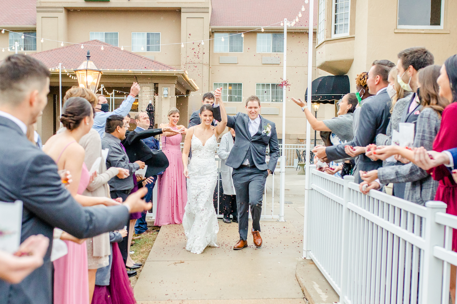 Bride and groom arriving fro reception of the lakehouse wedding