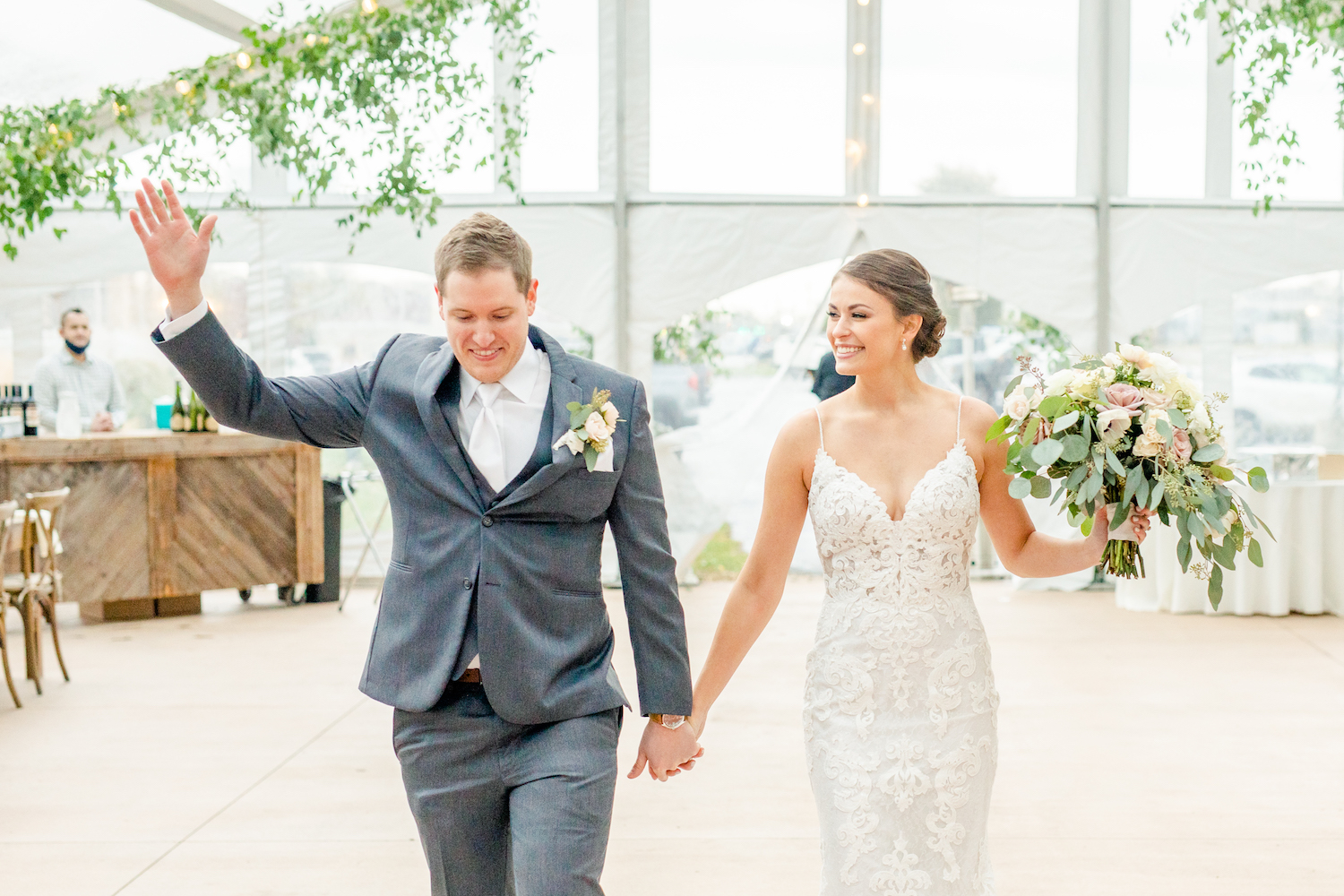 Bride and groom introduced at the lakehouse wedding