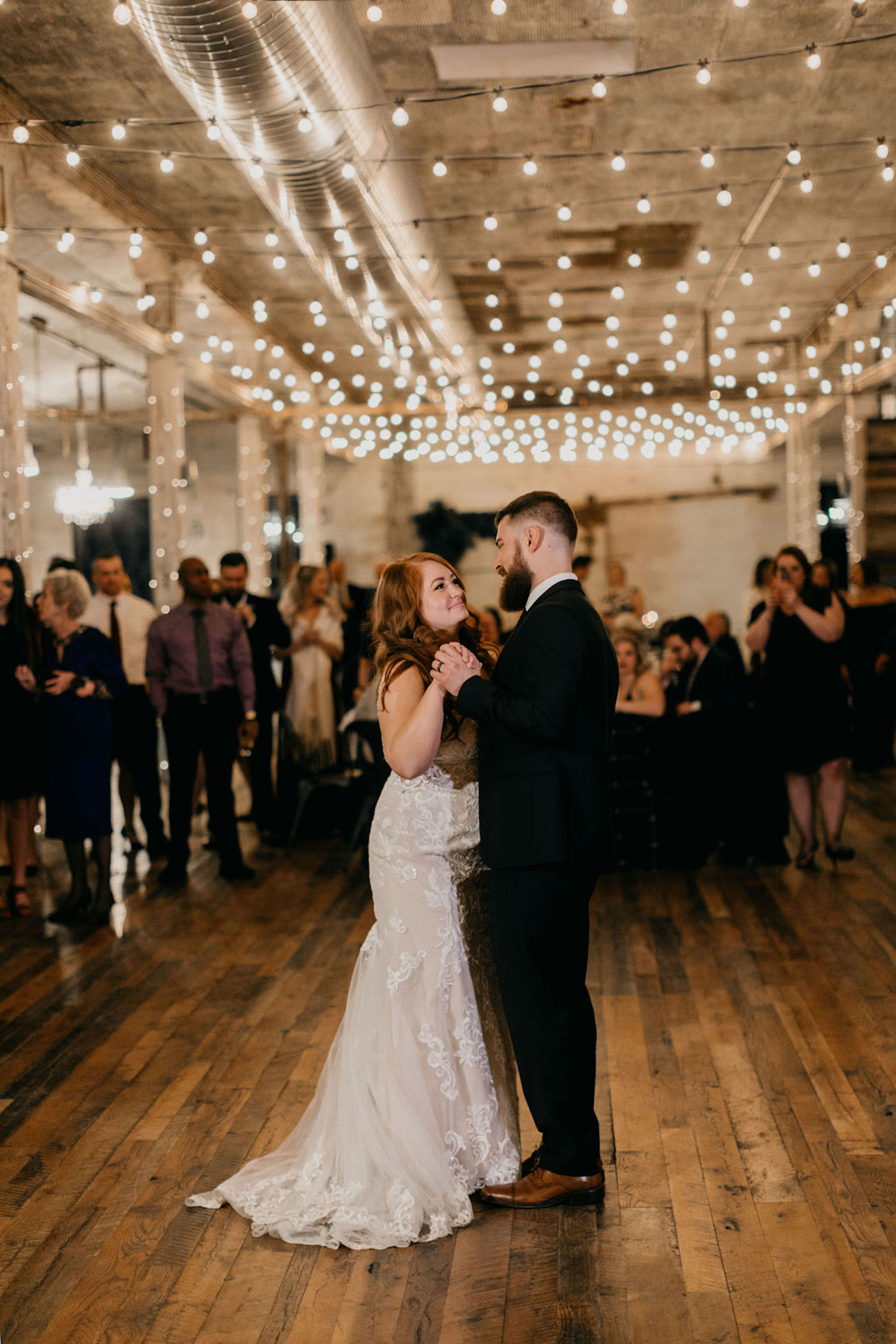 Bride and groom dancing together at their Journeyman Distillery wedding