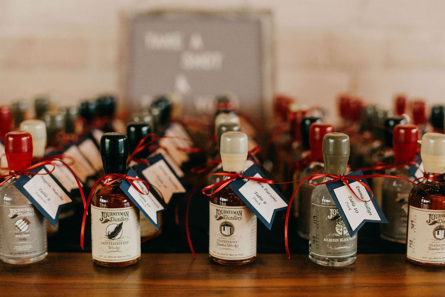 Shot bottles with name tags for Journeyman distillery wedding