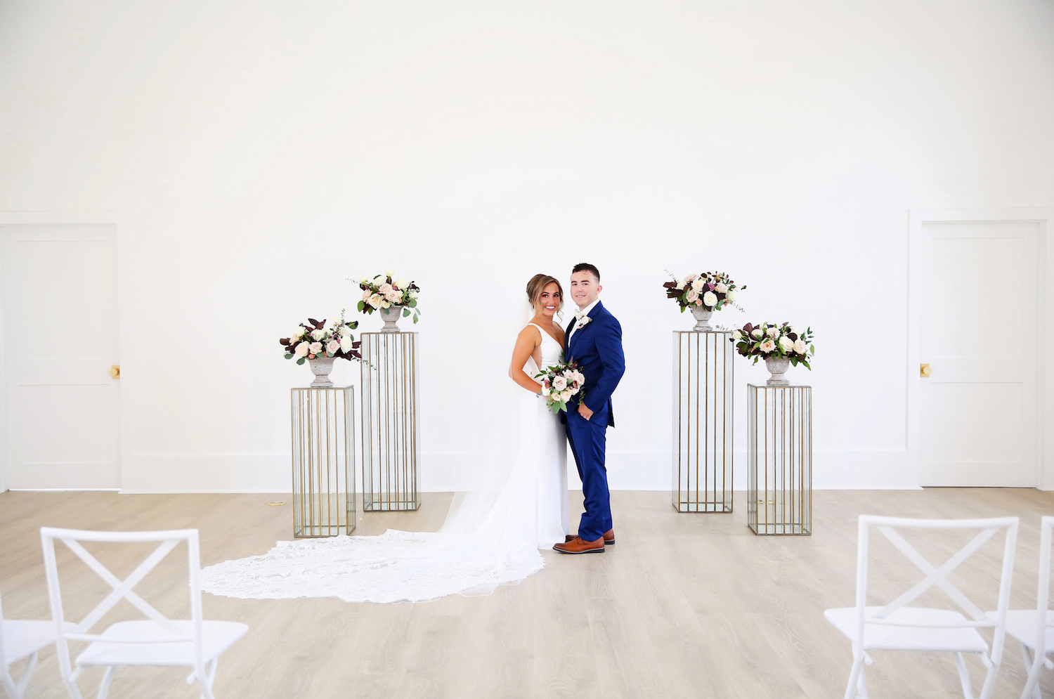 Bride and groom standing together smiling at their kalamazoo michigan wedding