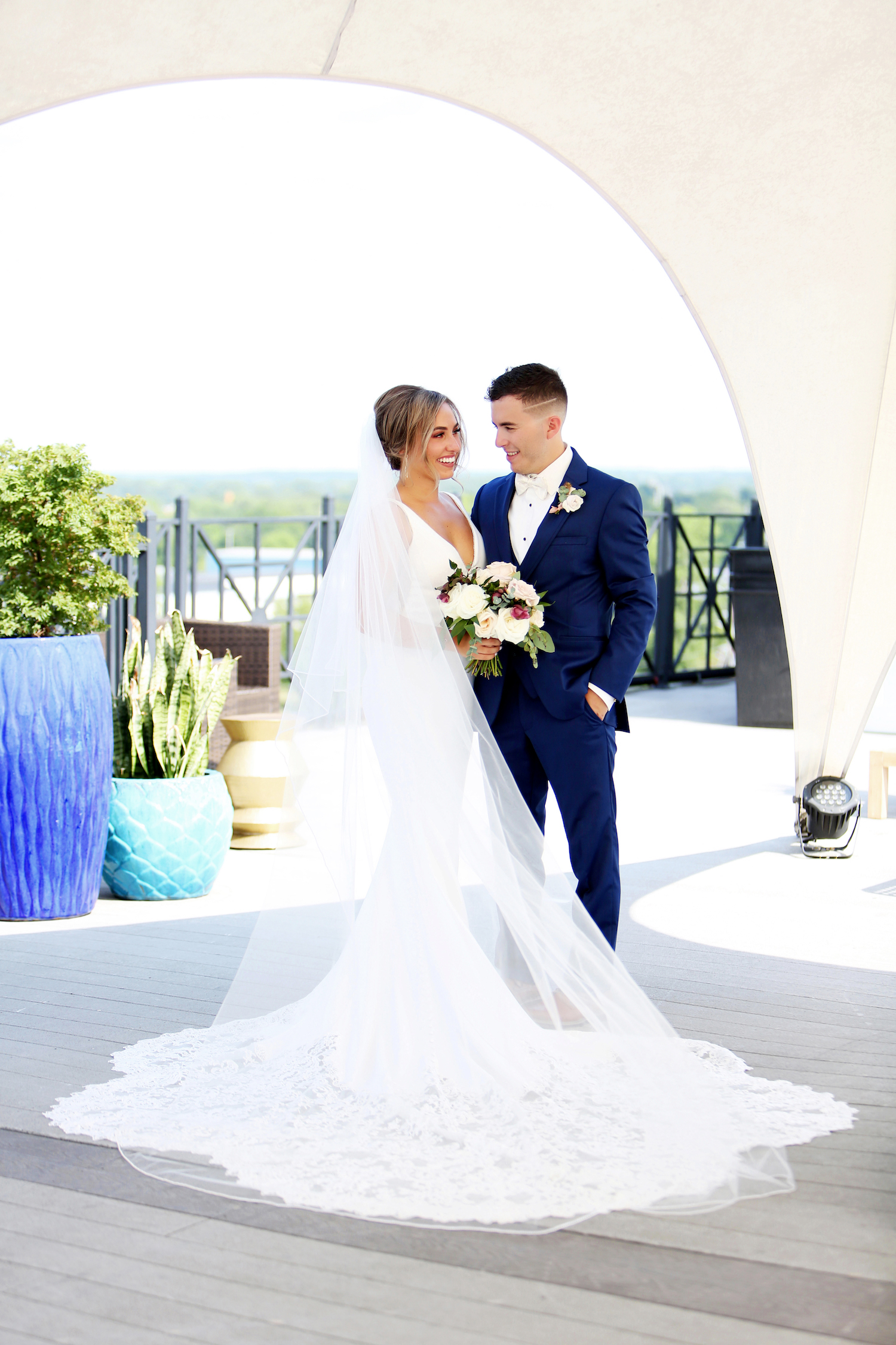 Bride and groom on rooftop at Kalamazoo Michigan wedding