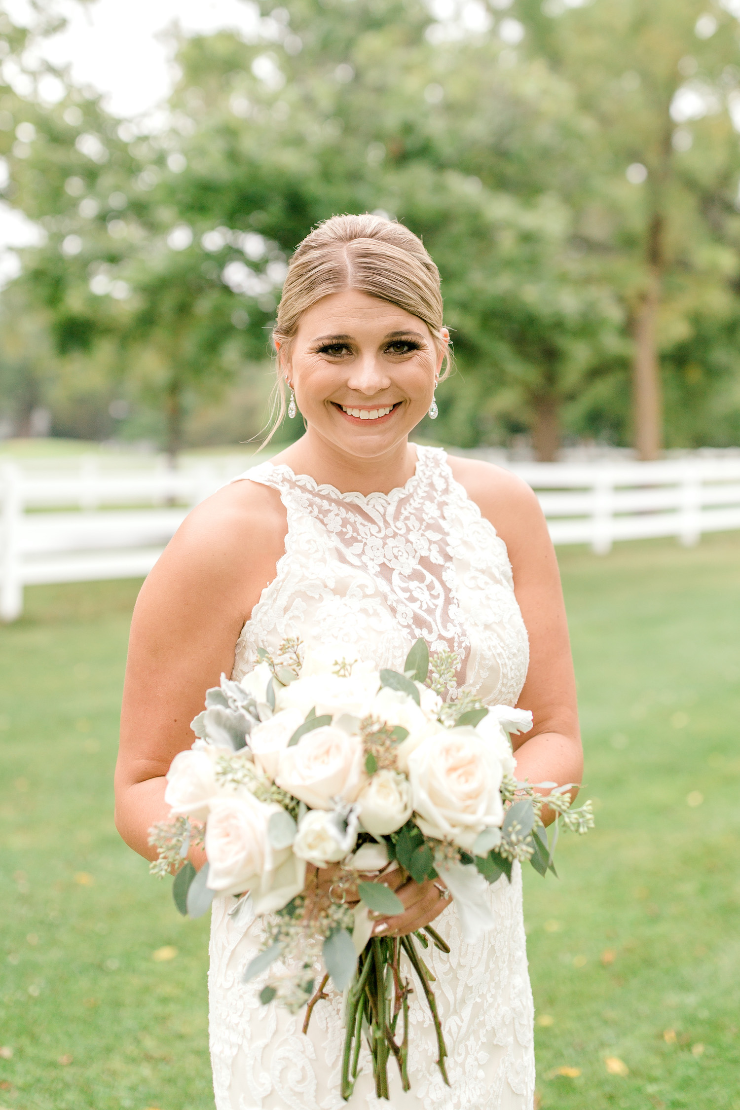 Bride smiling before Wallinwood Springs Golf Course wedding