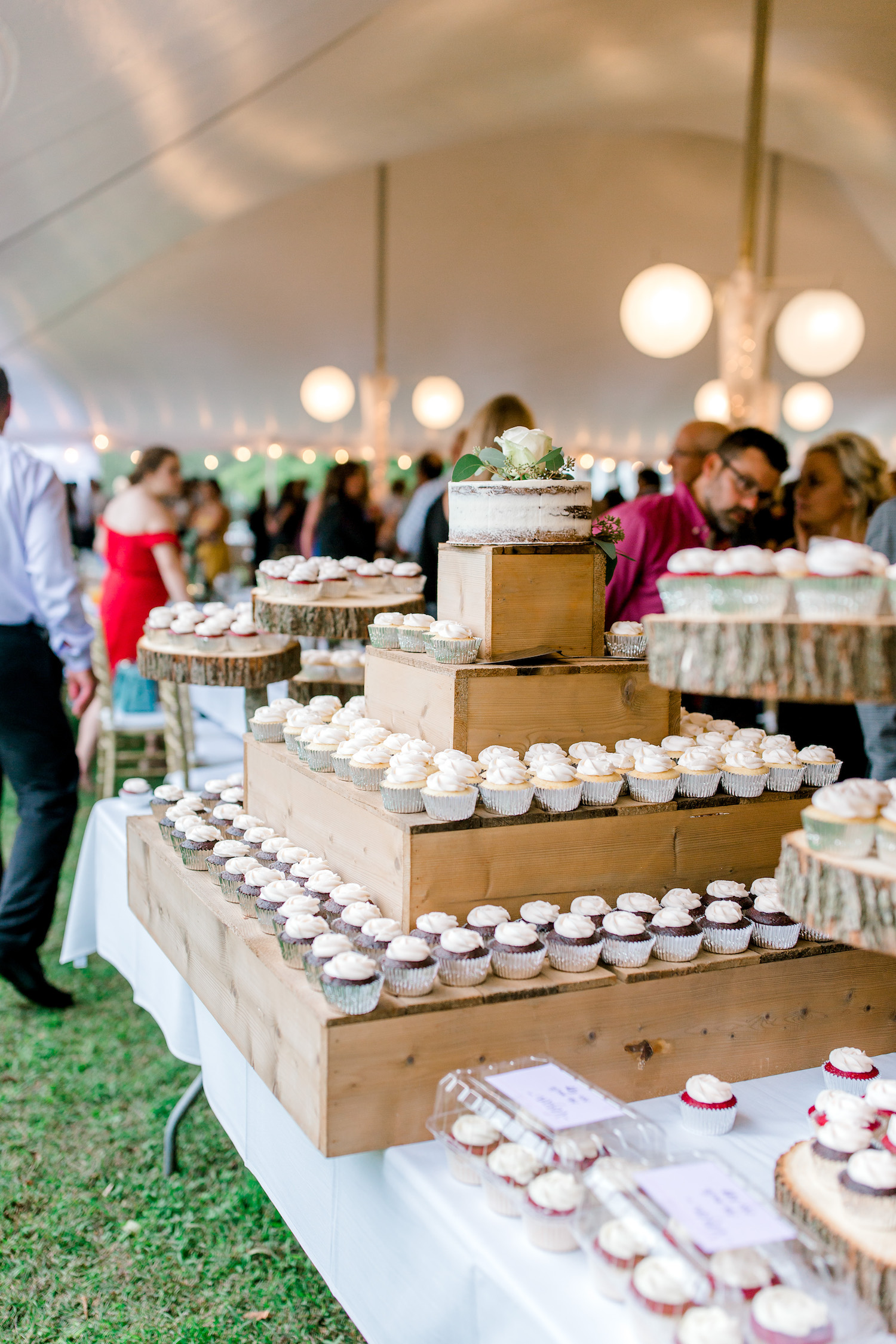 Cupcakes and cake on tier stand