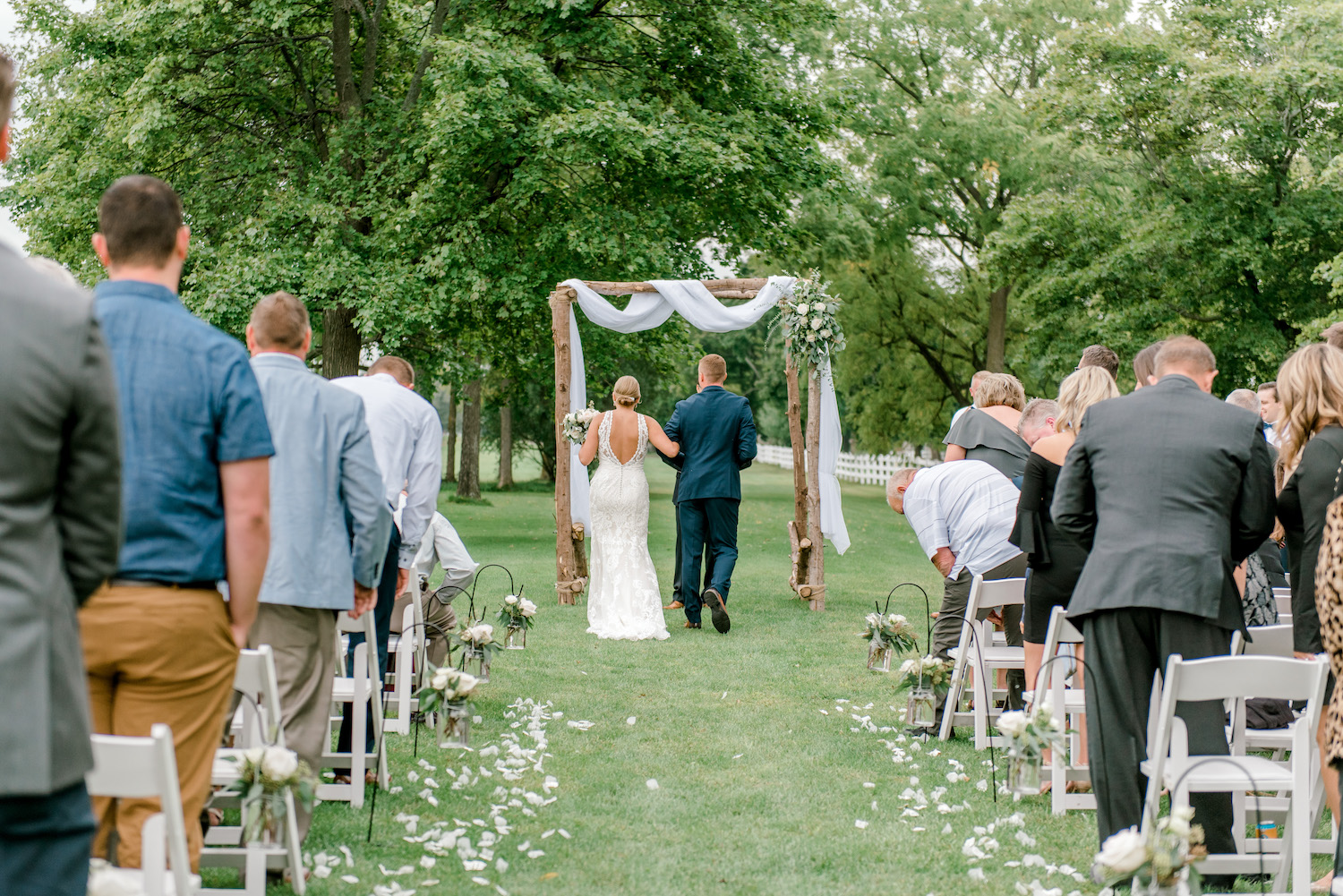 Bride and groom standing at alter