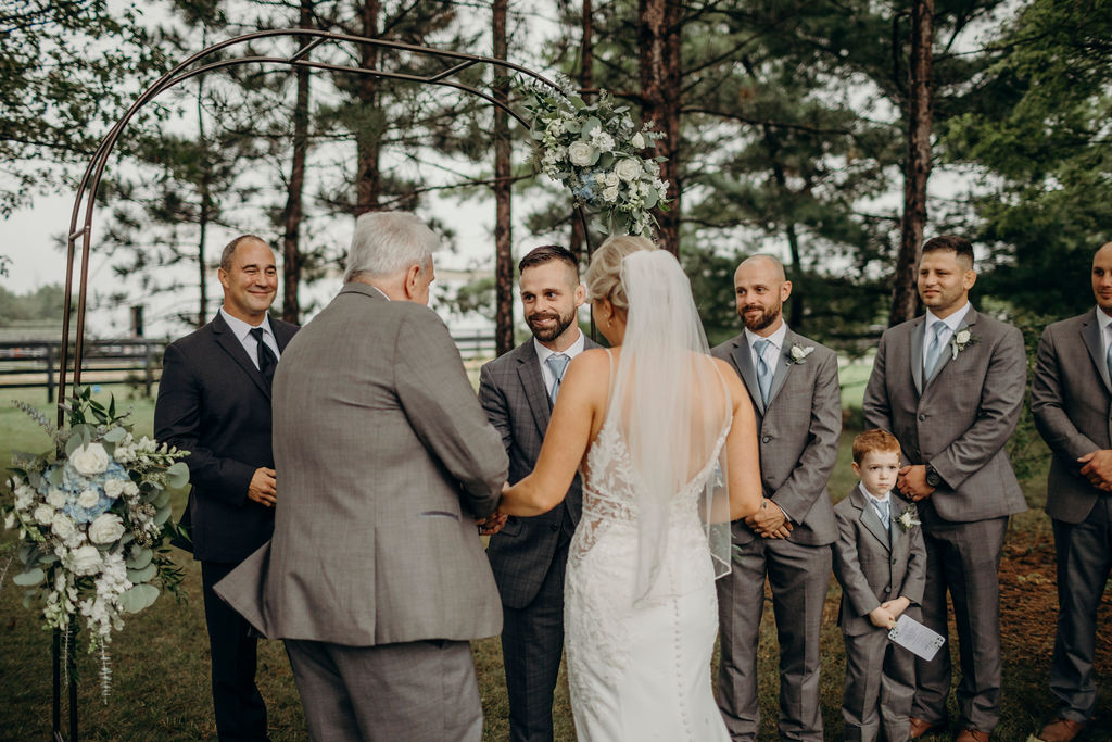 Father giving bride away to groom at Frankfort, IL Wedding