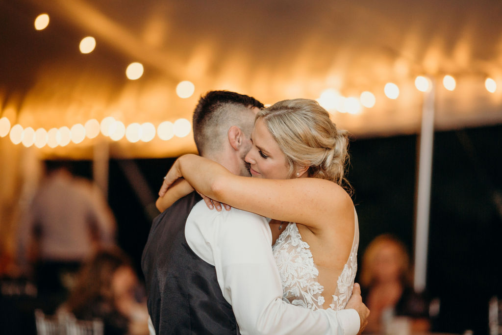 Bride and groom dancing together