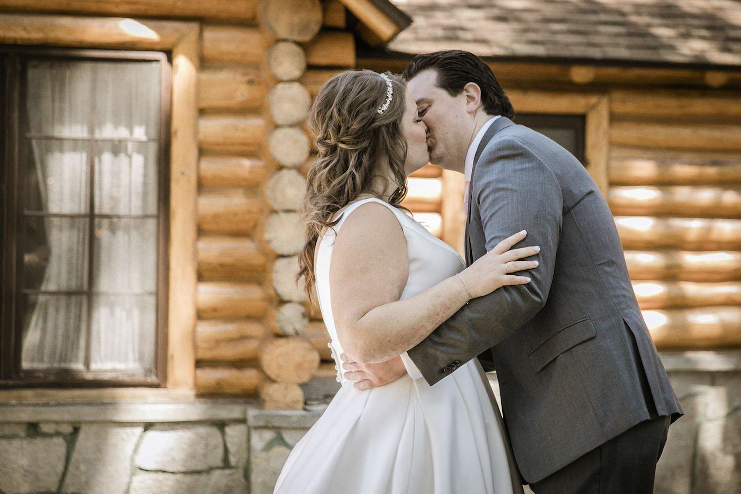 Bride and groom kissing