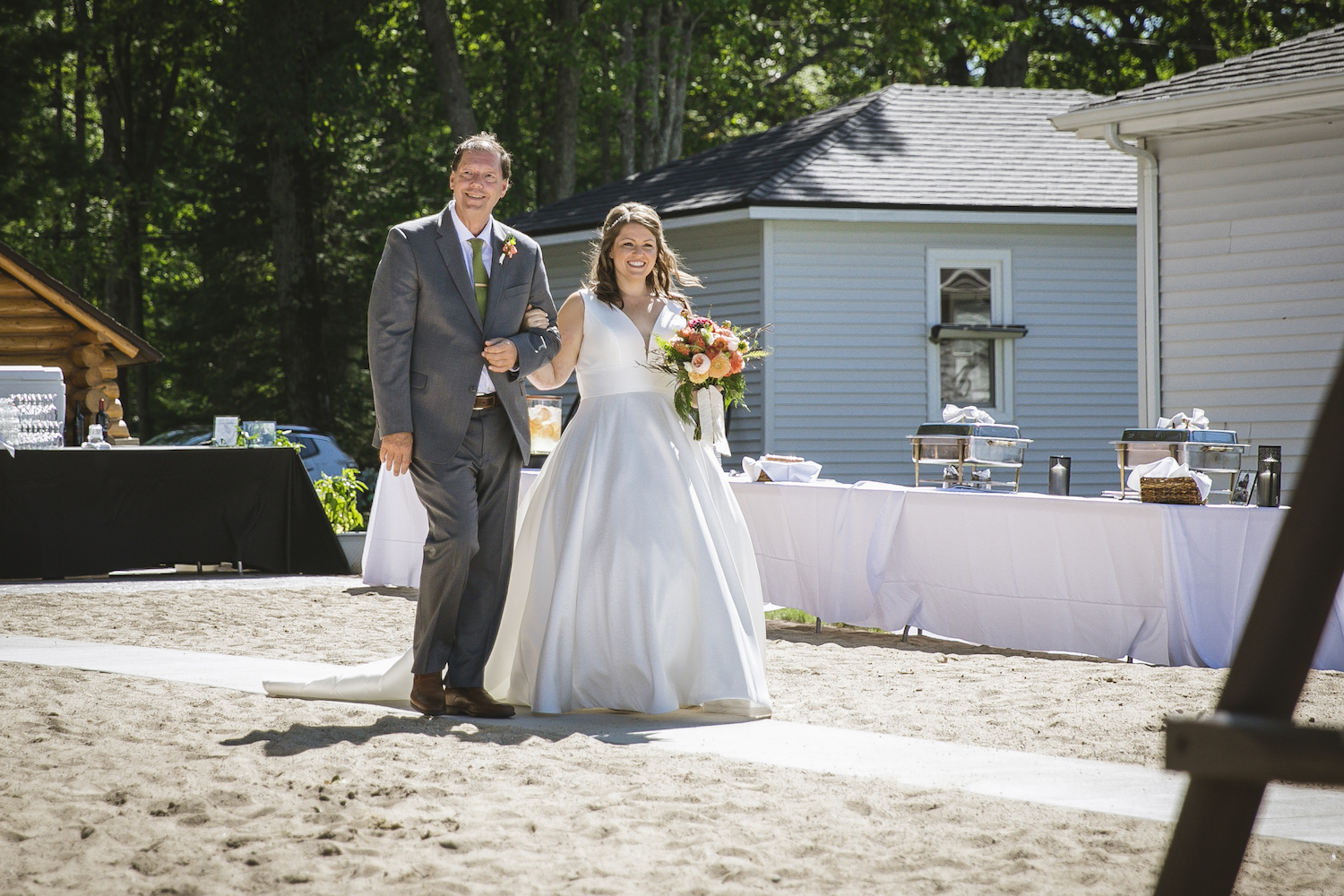 Bride walking down aisle with her father