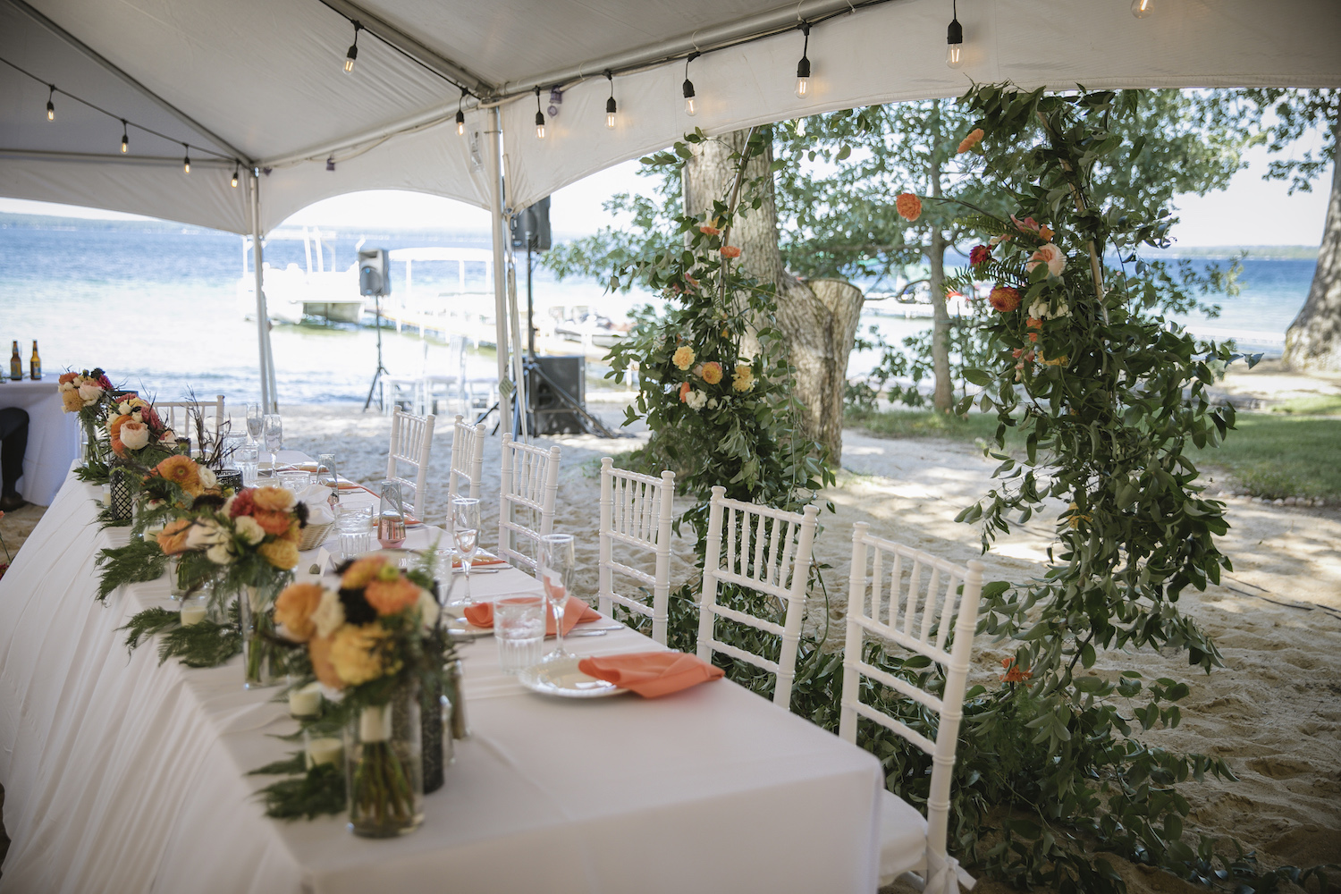 Head table with hoop floral arrangement