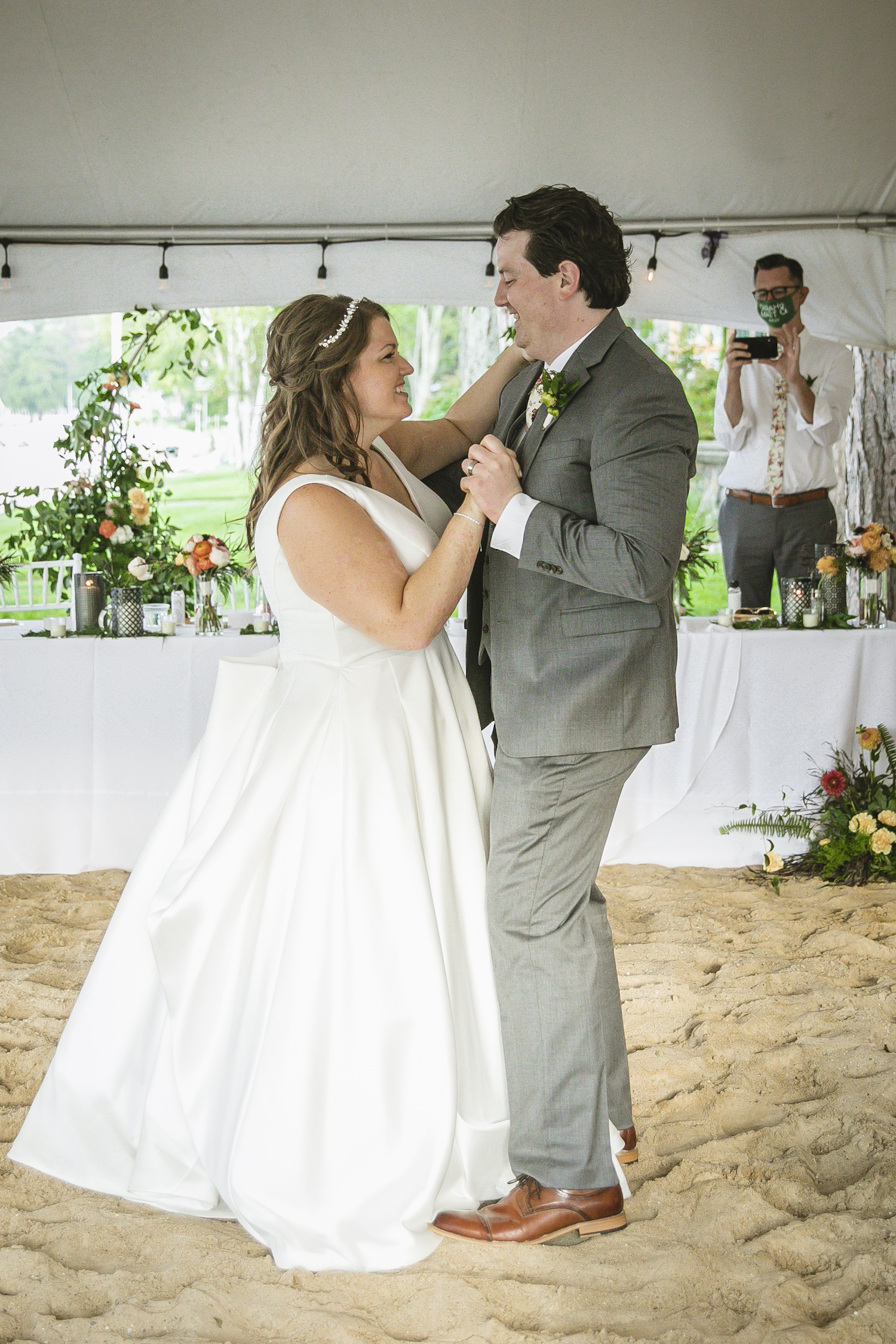 Bride and groom first dance at Higgins lake wedding