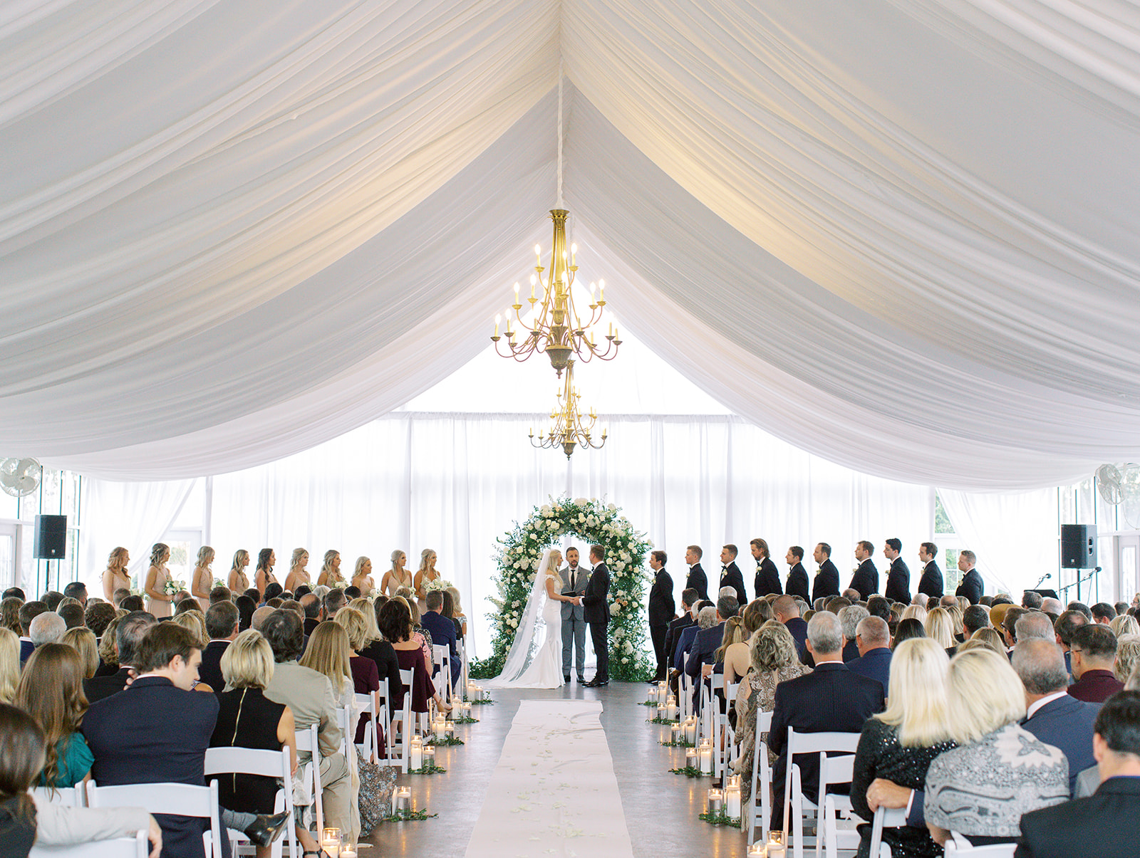 Bride and groom standing at alter of Ritz Charles wedding ceremony