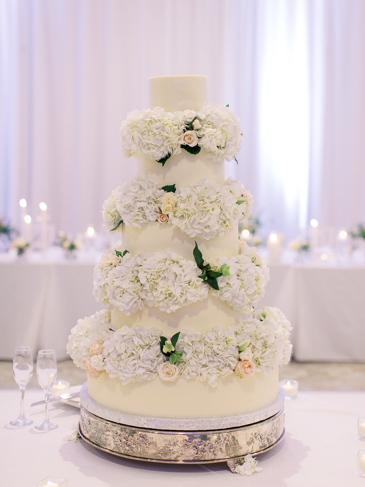 Ritz Charles wedding cake with floral decor