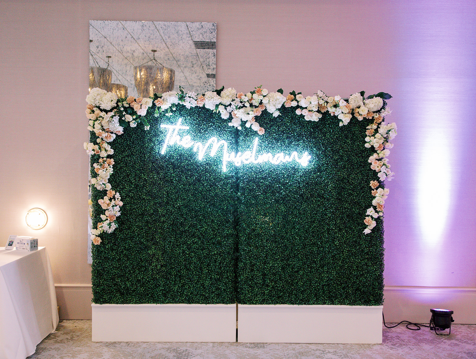 Ritz Charles wedding neon sign and floral background