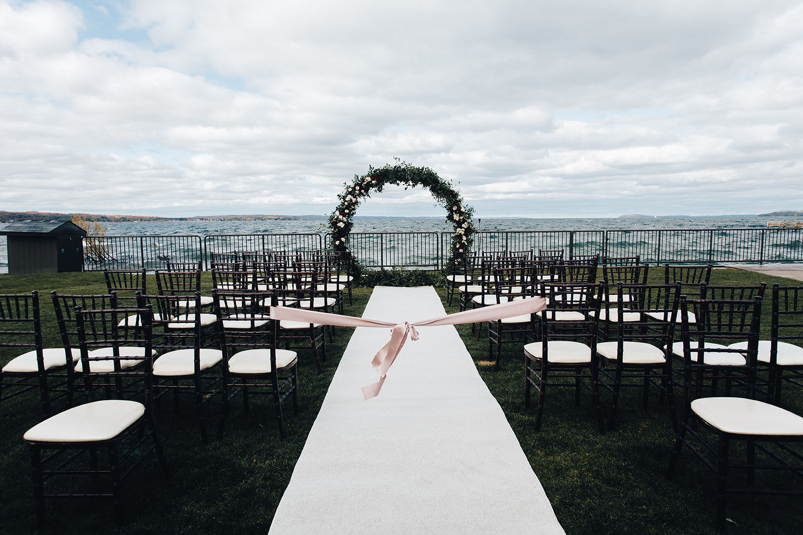 West Bay Beach wedding ceremony space next to lake