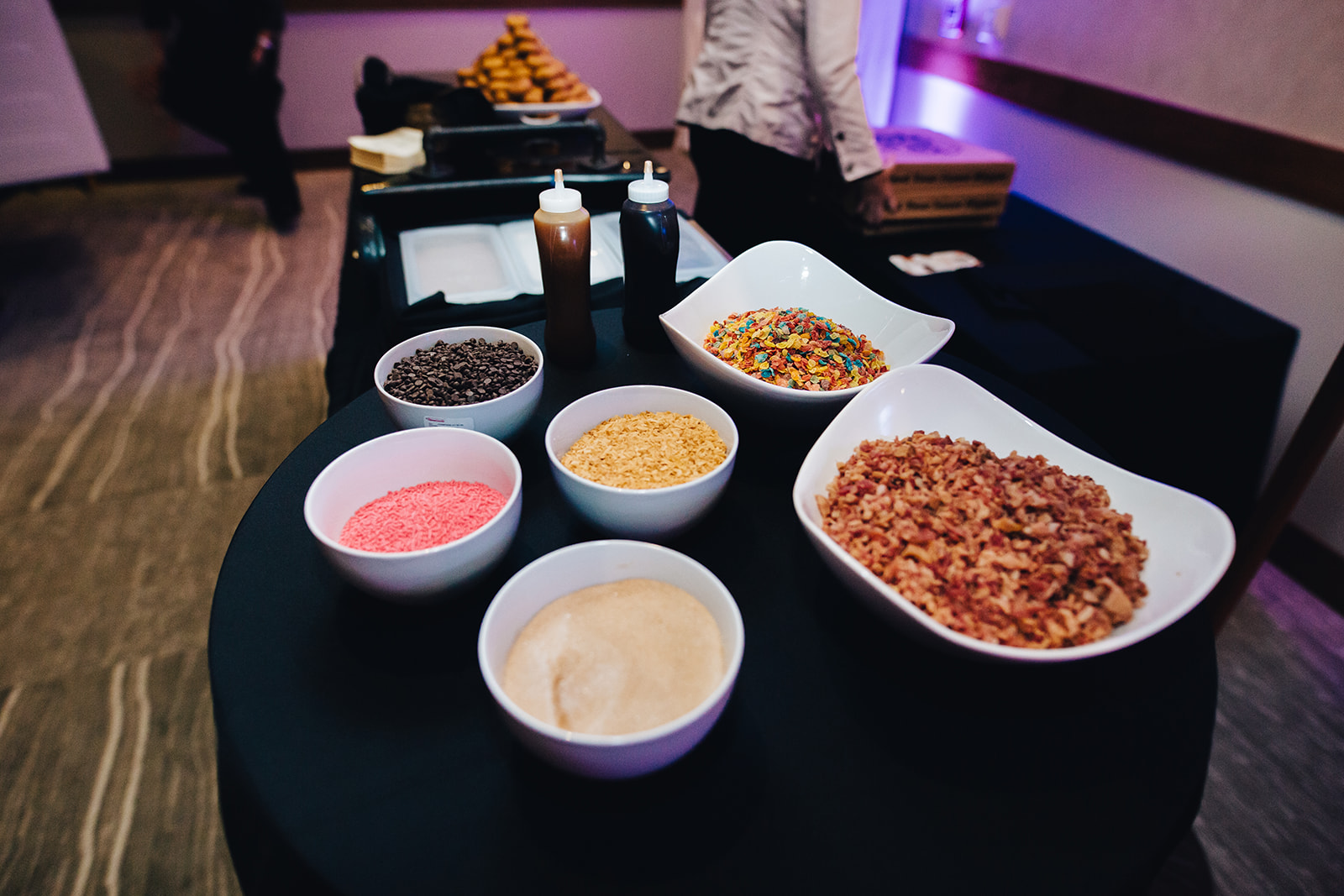 Donut toppings display for West Bay Beach wedding