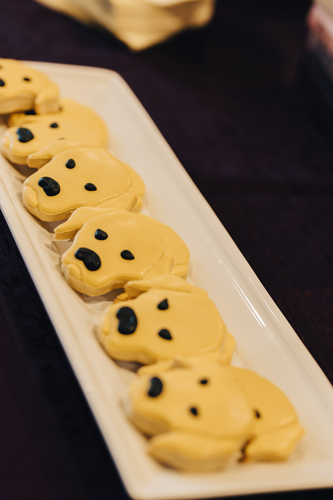 Dog face shaped cookies for West Bay Beach wedding