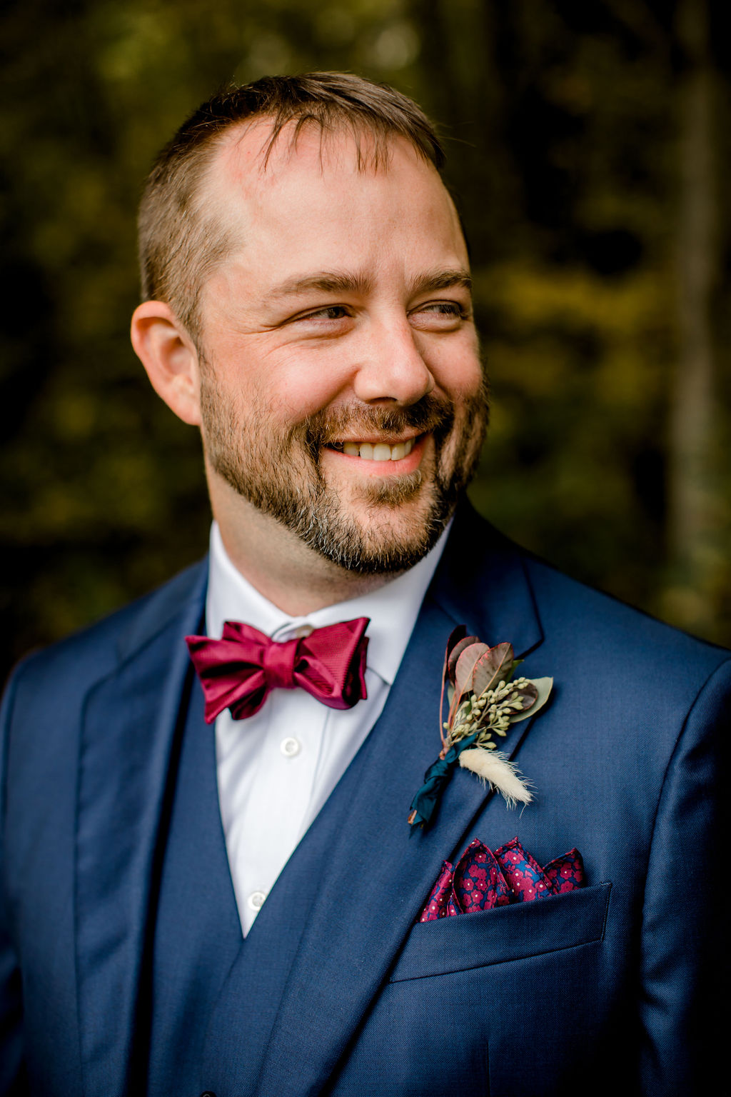 Groom smiling before Jackson, MI wedding