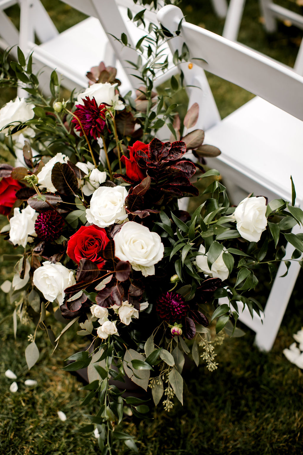 Floral piece at aisle entrance of Jackson, MI wedding