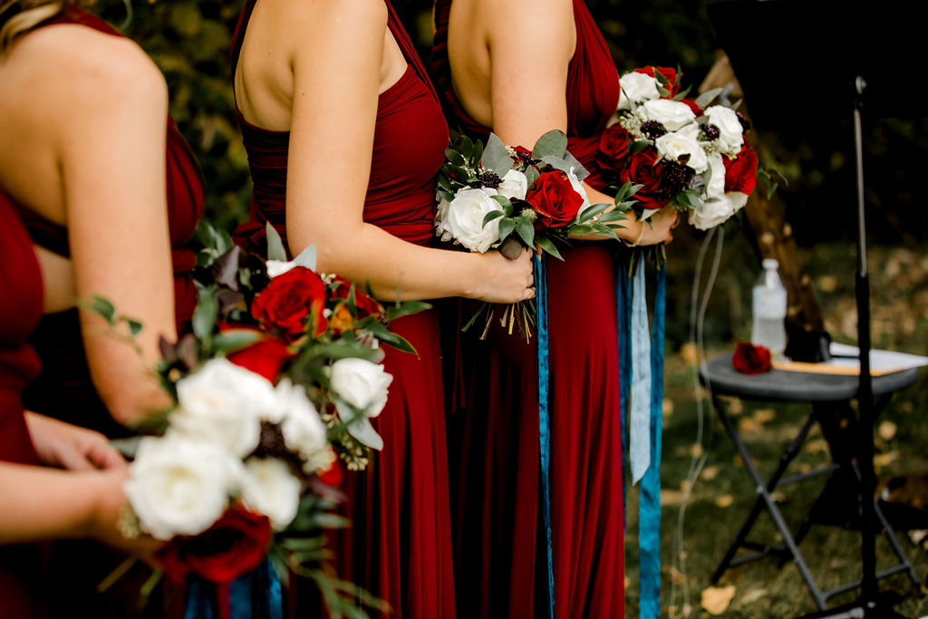 Bridesmaids holding bouquets at Jackson, MI wedding