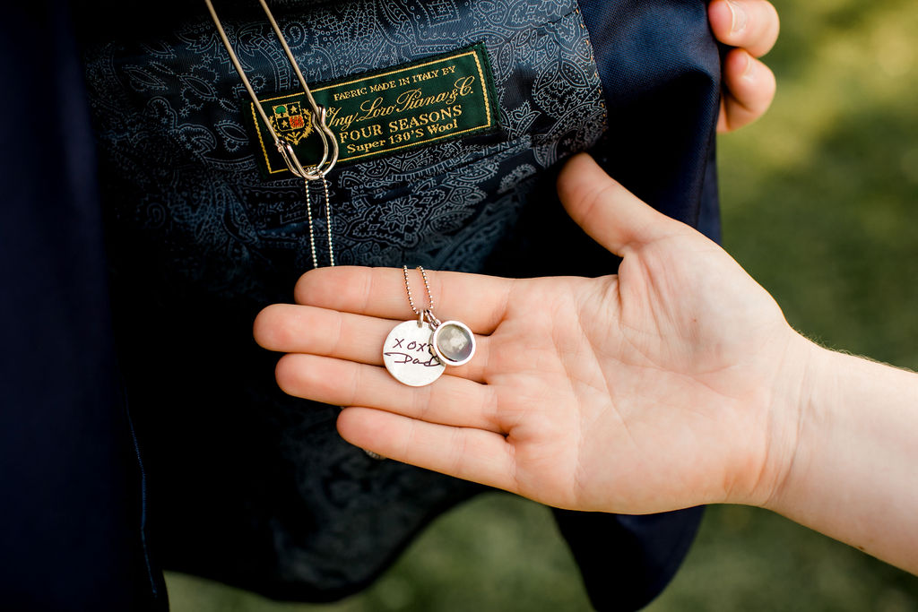 Charm on grooms jacket