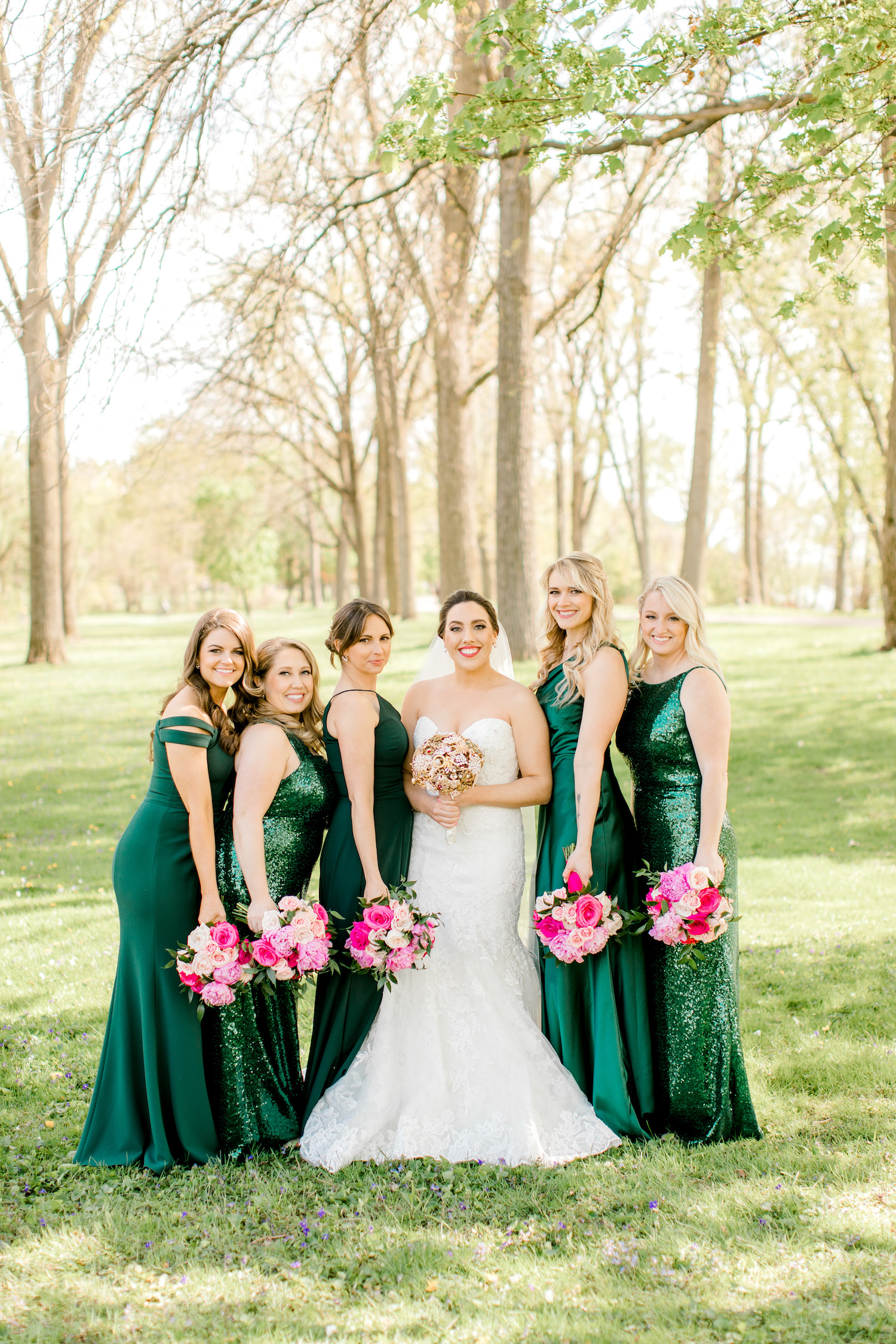 Bride standing with her bridesmaids outside