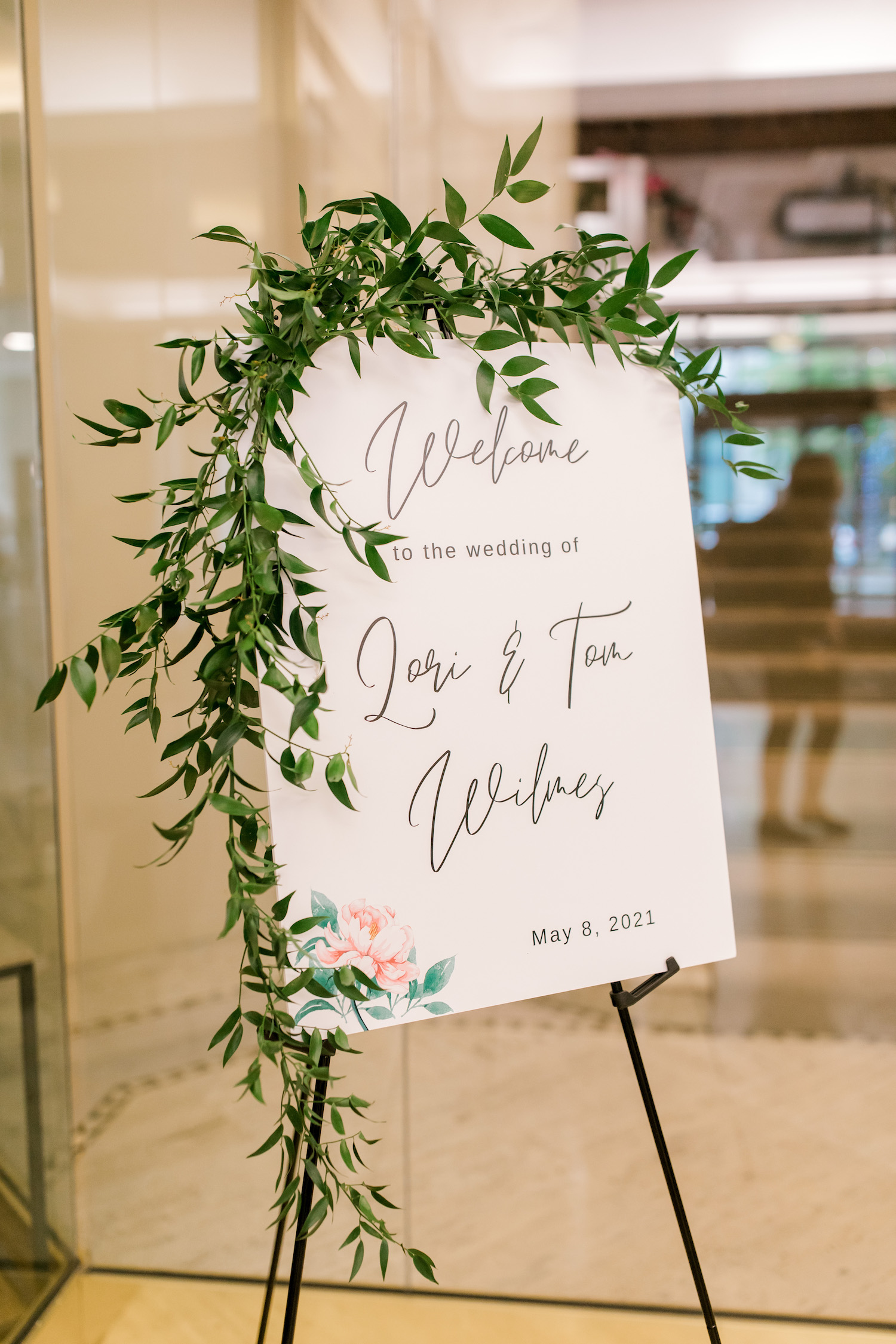 Ceremony welcome sign at City Flats Hotel wedding