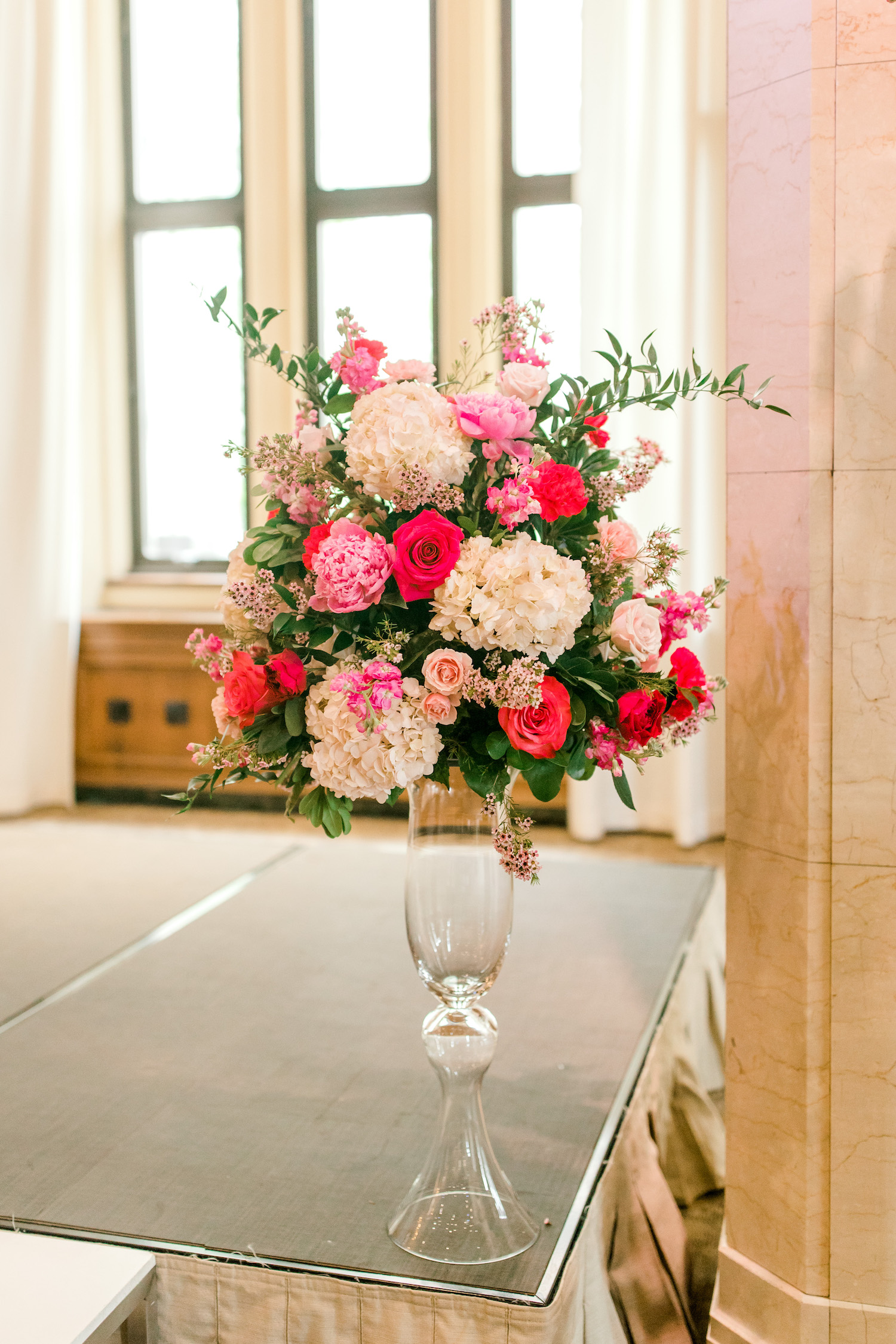 Floral vase at ceremony of City Flats Hotel wedding