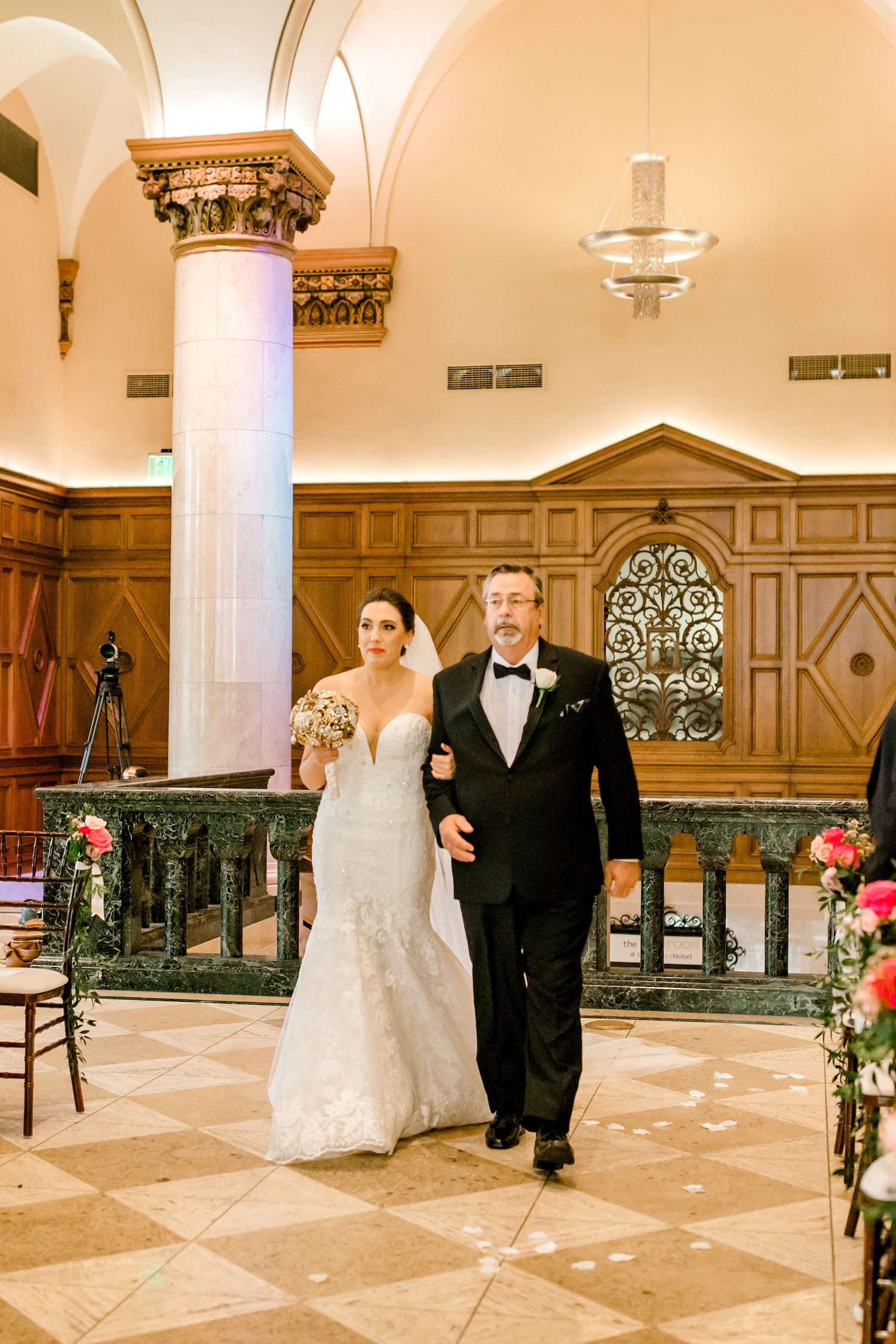 Bride walking down aisle at City Flats Hotel wedding