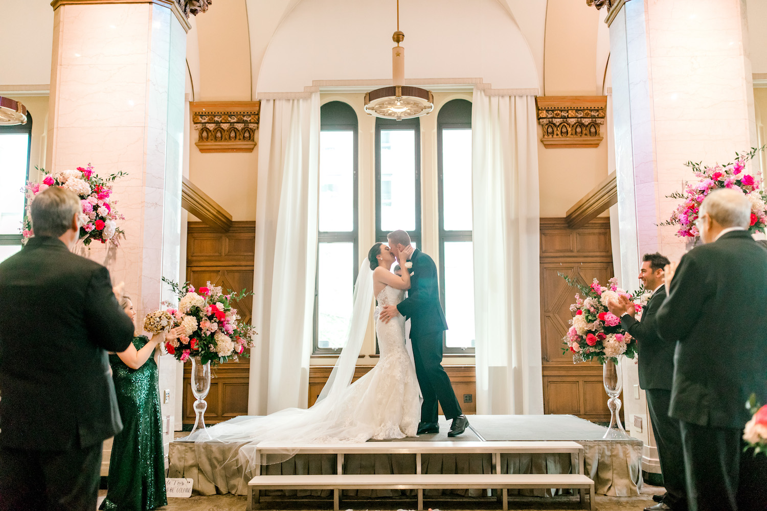 Bride and groom kissing at ceremony end